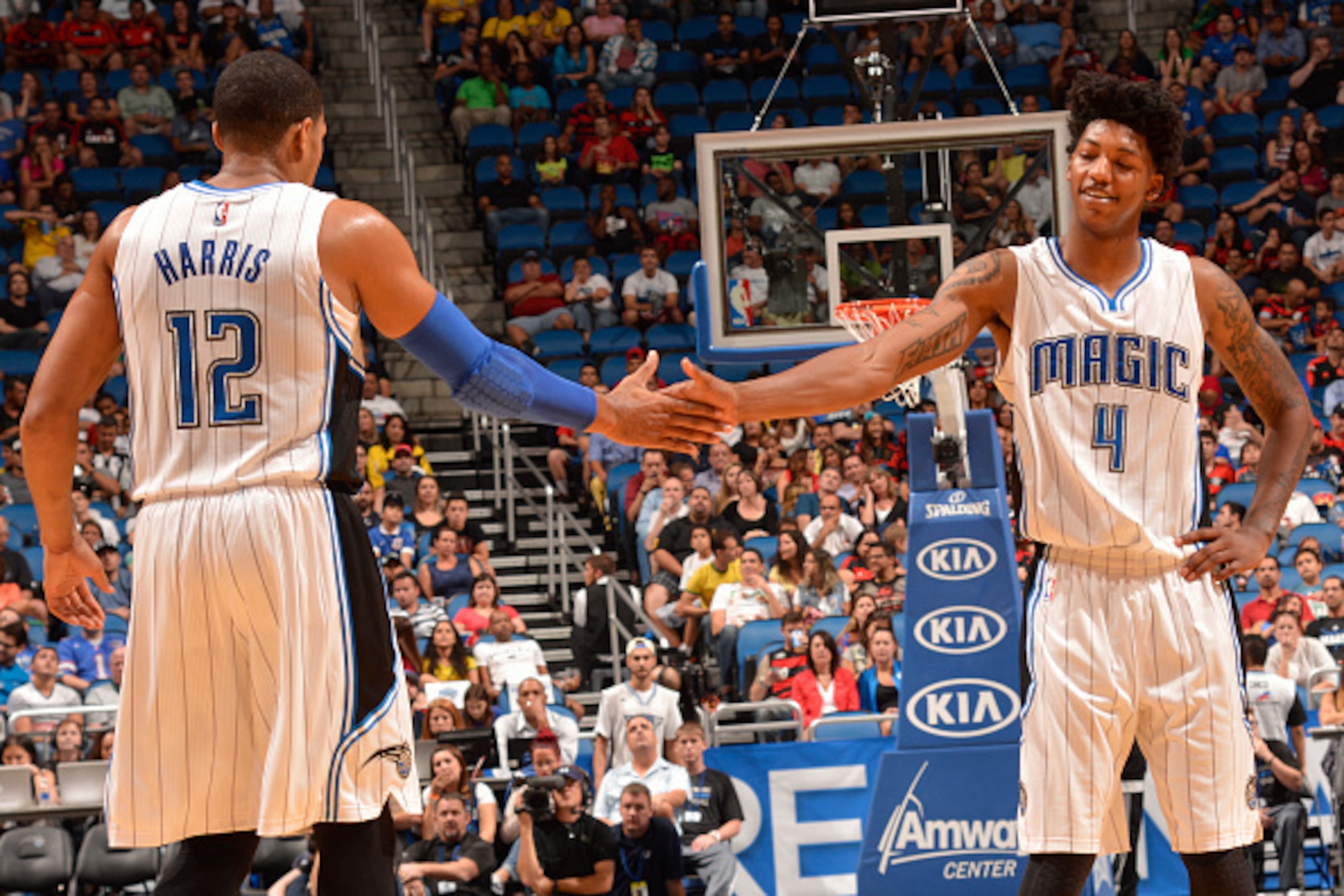 ORLANDO, FL - OCTOBER 15: Tobias Harris #12 and Elfrid Payton #4 of the Orlando Magic slap hands during the game against Flamengo Brazil on October 15, 2014 at Amway Center in Orlando, Florida. NOTE TO USER: User expressly acknowledges and agrees that, b ORLANDO, FL - OCTOBER 15: Tobias Harris #12 and Elfrid Payton #4 of the Orlando Magic slap hands during the game against Flamengo Brazil on October 15, 2014 at Amway Center in Orlando, Florida. NOTE TO USER: User expressly acknowledges and agrees that, b