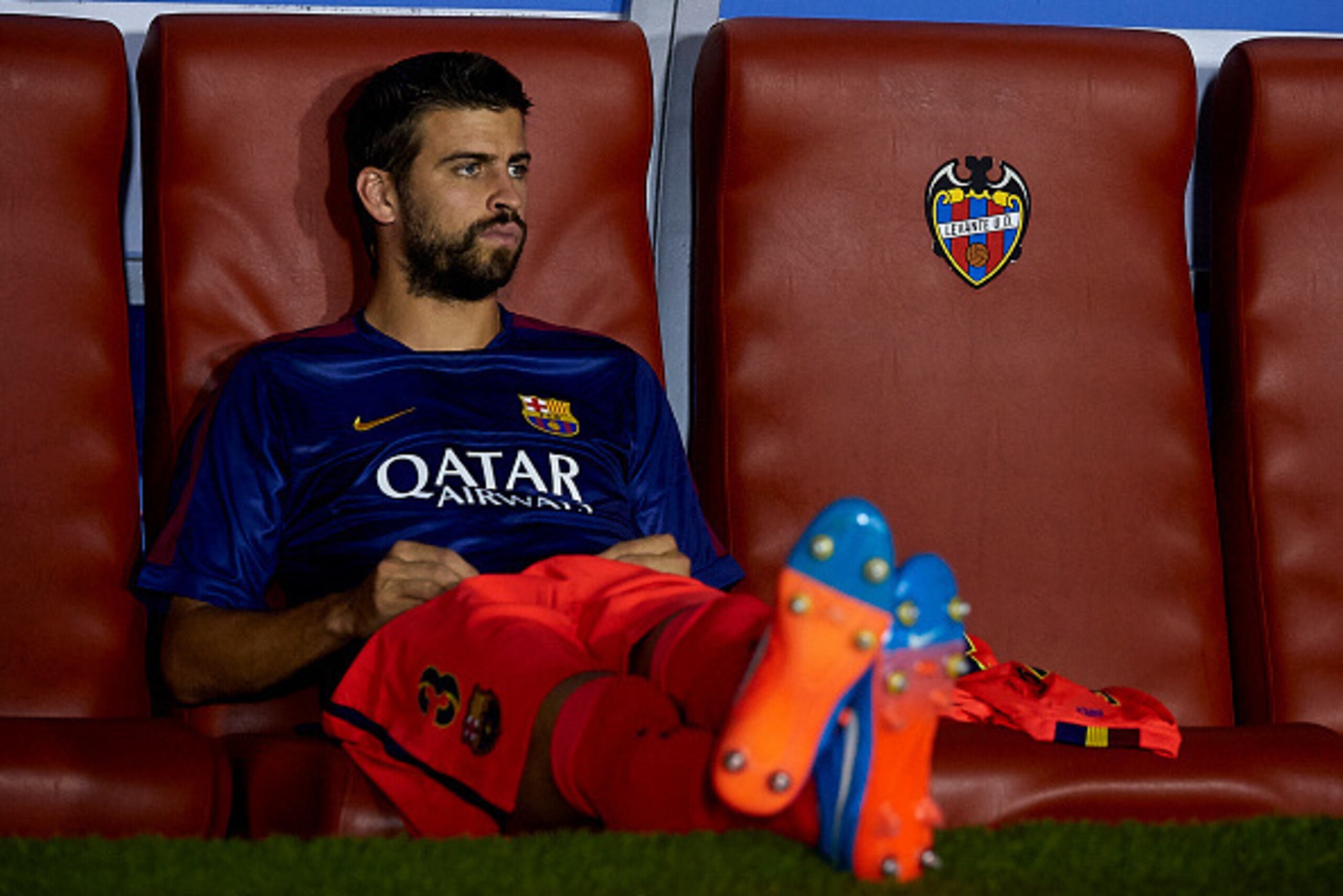 VALENCIA, SPAIN - SEPTEMBER 21:  Gerard Pique of Barcelona watches from the subsitute bench prior to the La Liga match between Levante UD and FC Barcelona at Ciutat de Valencia on September 21, 2014 in Valencia, Spain.  (Photo by Manuel Queimadelos Alonso