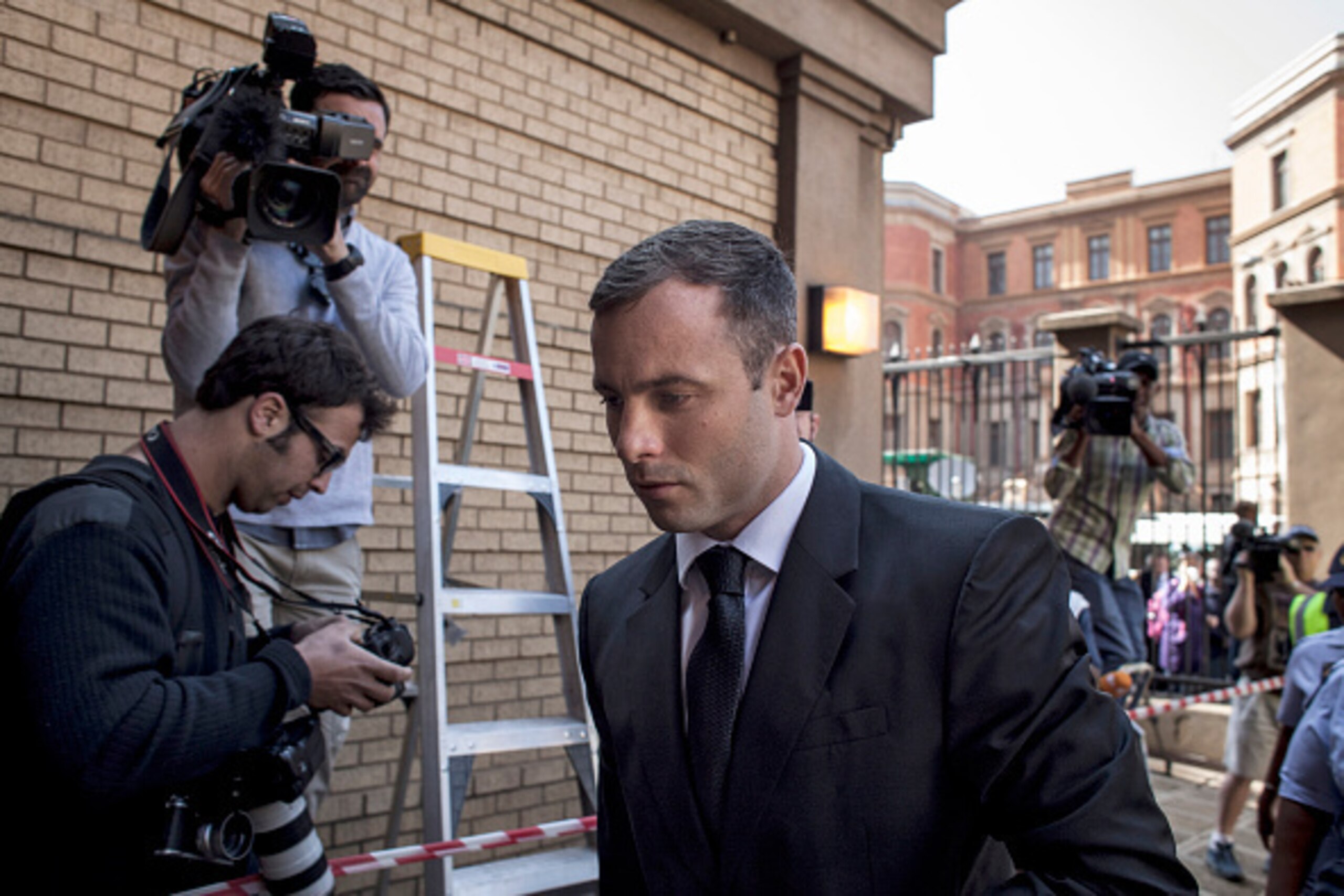 PRETORIA, SOUTH AFRICA - OCTOBER 17: Oscar Pistorius arrives at the North Gauteng High Court  for the fifth day of sentencing on October 17, 2014 in Petoria, South Africa. Pistorius will be sentenced having been found guilty of the culpable homicide of hi