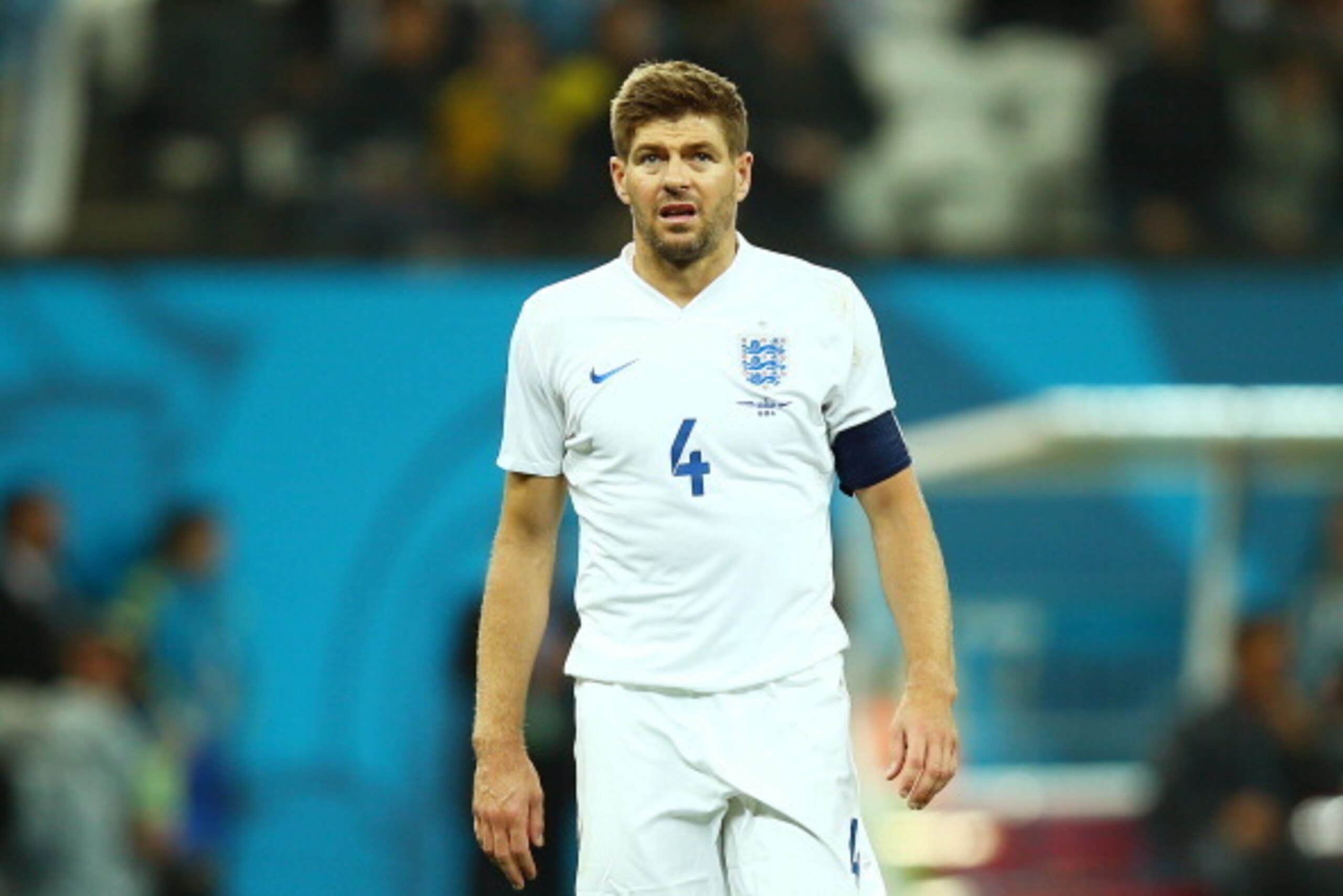 SAO PAULO, BRAZIL - JUNE 19:  Steven Gerrard of England (R) looks dejected after a 2-1 defeat in  the 2014 FIFA World Cup Brazil Group D match between Uruguay and England at Arena de Sao Paulo on June 19, 2014 in Sao Paulo, Brazil.  (Photo by Clive Rose/G