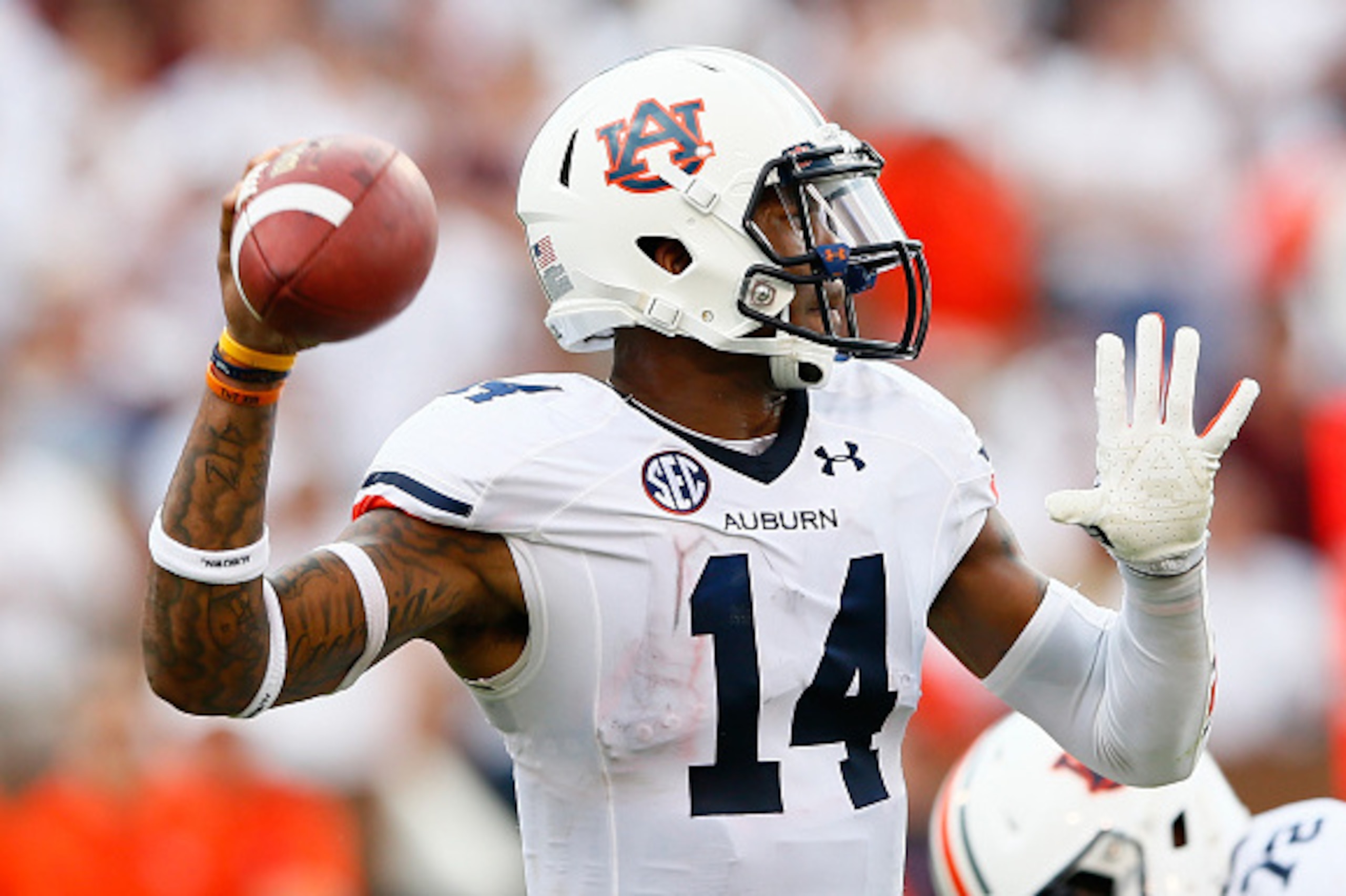 STARKVILLE, MS - OCTOBER 11:  Nick Marshall #14 of the Auburn Tigers looks to pass against the Mississippi State Bulldogs at Davis Wade Stadium on October 11, 2014 in Starkville, Mississippi.  (Photo by Kevin C. Cox/Getty Images)