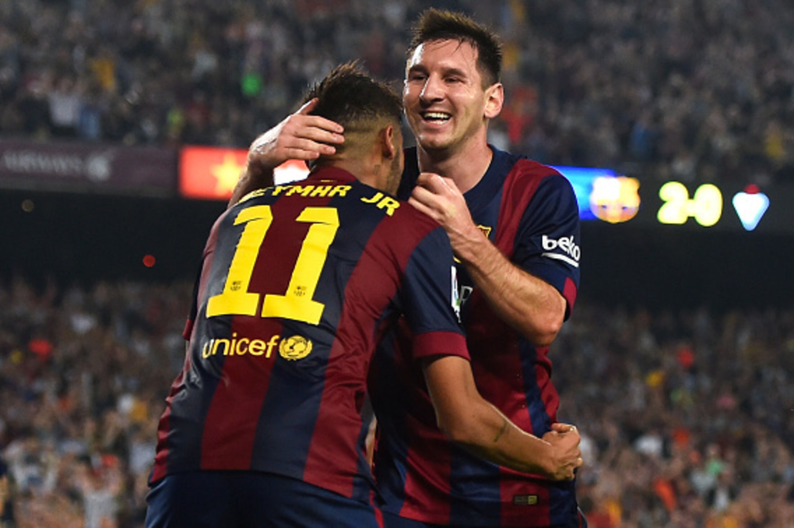 BARCELONA, SPAIN - OCTOBER 18:  Lionel Messi of FC Barcelona celebrates with his teammate Neymar of FC Barcelona after scoring his team's third goal during the La Liga match between FC Barcelona and SD Eibar at Camp Nou on October 18, 2014 in Barcelona, S