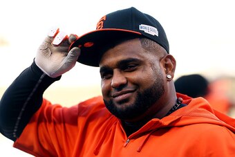 KANSAS CITY, MO - OCTOBER 20:  Pablo Sandoval #48 of the San Francisco Giants practices during the 2014 World Series Media Day at Kauffman Stadium on October 20, 2014 in Kansas City, Missouri.  (Photo by Elsa/Getty Images)