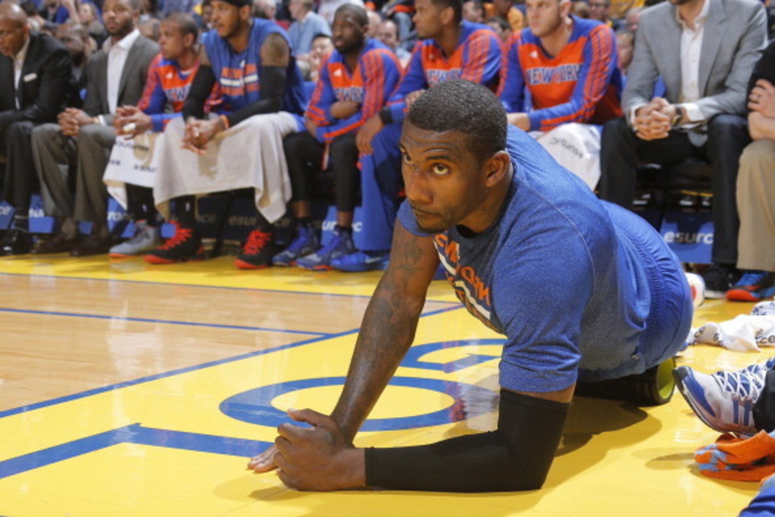 OAKLAND, CA - MARCH 30: Amar'e Stoudemire #1 of the New York Knicks stretches out during the game against the Golden State Warriors on March 30, 2014 at Oracle Arena in Oakland, California. NOTE TO USER: User expressly acknowledges and agrees that, by dow