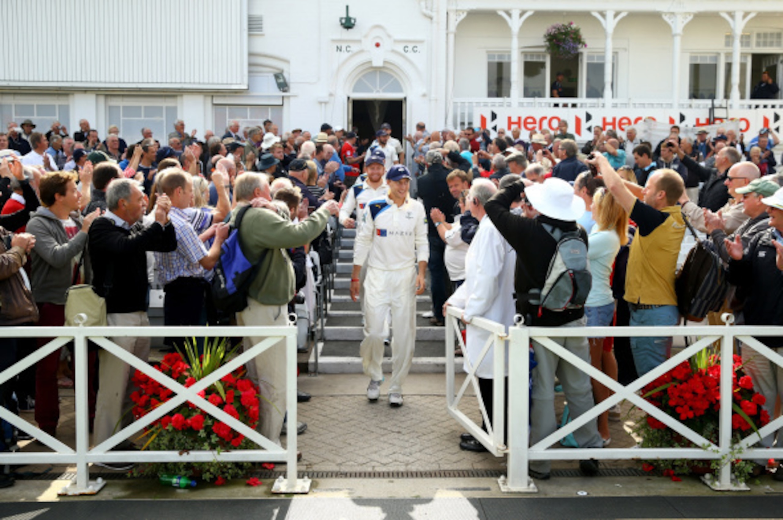 NOTTINGHAM, ENGLAND - SEPTEMBER 12:  Joe Root leads the victorious Yorkshire team out of the dressing room after they secured victory against Nottinghamshire and won the league during the fourth day of the LV County Championship match between Nottinghamsh