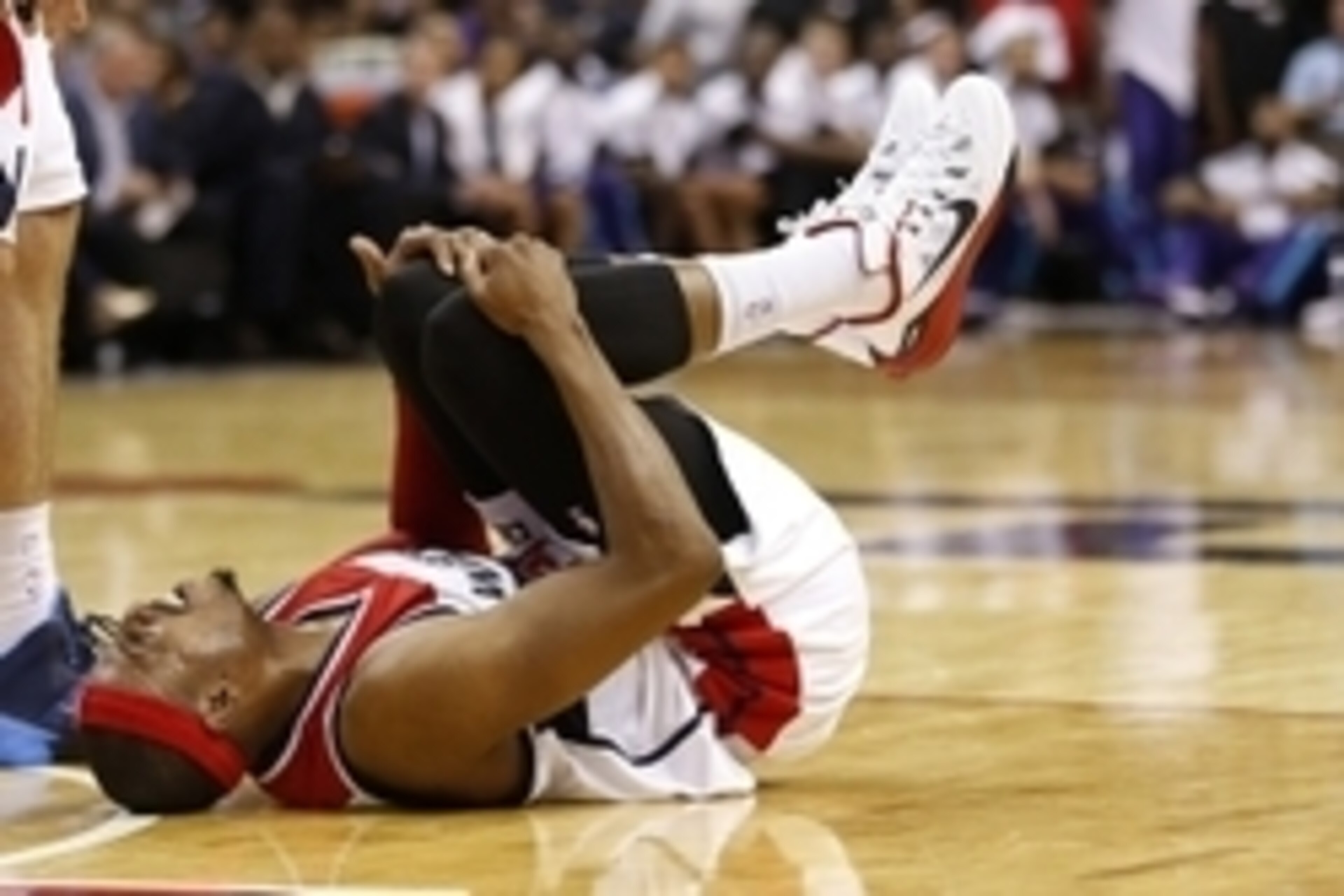 Oct 17, 2014; Washington, DC, USA; Washington Wizards forward Paul Pierce (34) lies on the court after being injured against the Charlotte Hornets in the second quarter at Verizon Center. Mandatory Credit: Geoff Burke-USA TODAY Sports