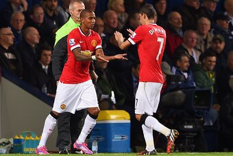 WEST BROMWICH, ENGLAND - OCTOBER 20:  Ashley Young of Manchester United replaces team mate Angel di Maria (R) as a substitute during the Barclays Premier League match between West Bromwich Albion and Manchester United at The Hawthorns on October 20, 2014 