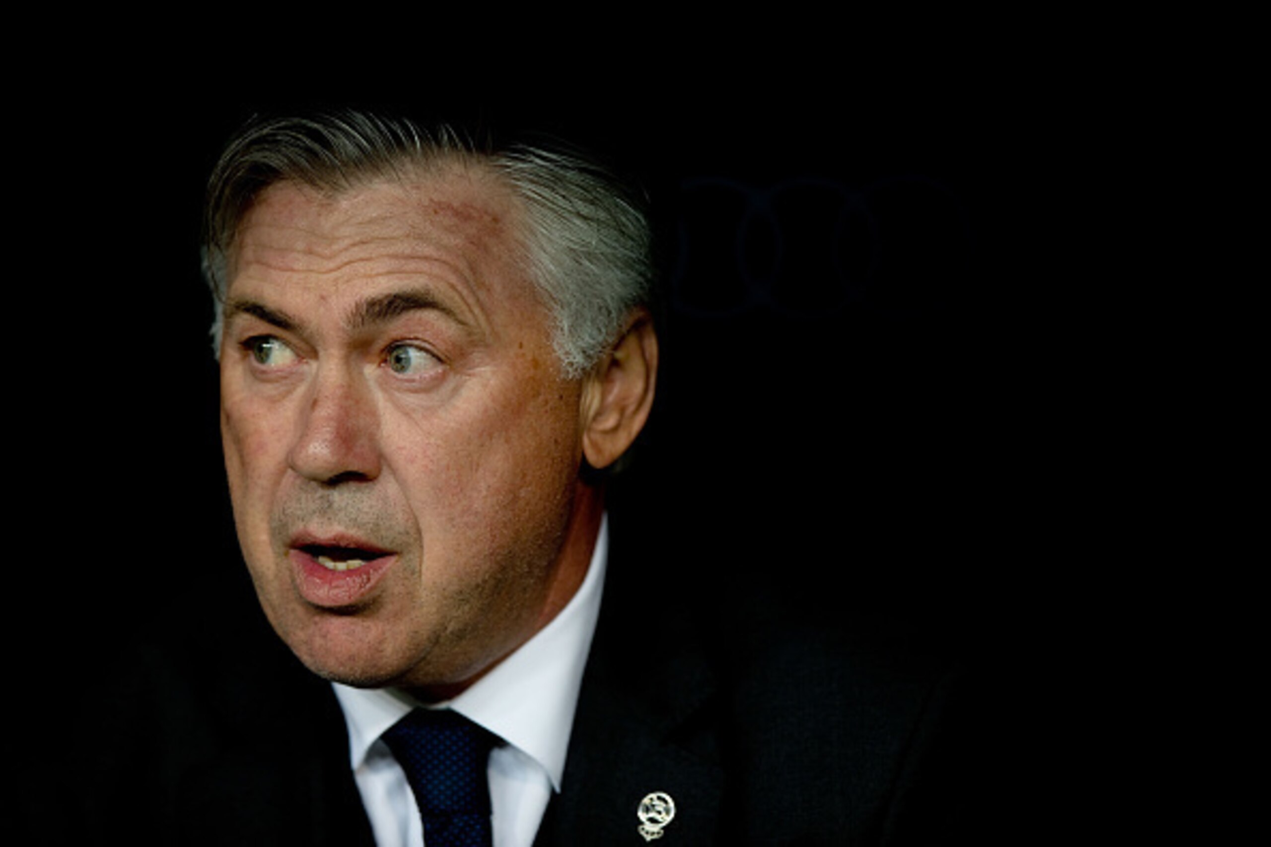 MADRID, SPAIN - SEPTEMBER 23:  Head Coach Carlo Ancelotti of Real Madrid CF looks on sitted on the bench prior to start the La Liga match between Real Madrid CF and Elche CF at Estadio Santiago Bernabeu on September 23, 2014 in Madrid, Spain.  (Photo by G