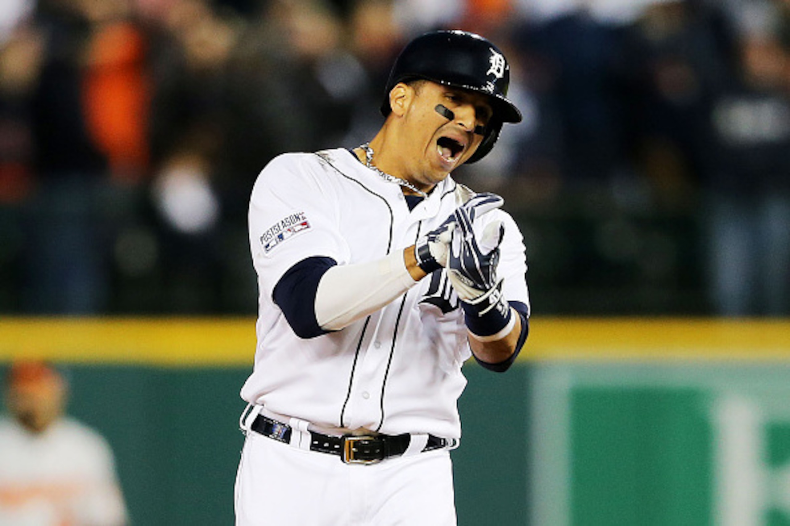 DETROIT, MI - OCTOBER 05:  Victor Martinez #41 of the Detroit Tigers celebrates his double in the ninth inning against the Baltimore Orioles during Game Three of the American League Division Series at Comerica Park on October 5, 2014 in Detroit, Michigan.