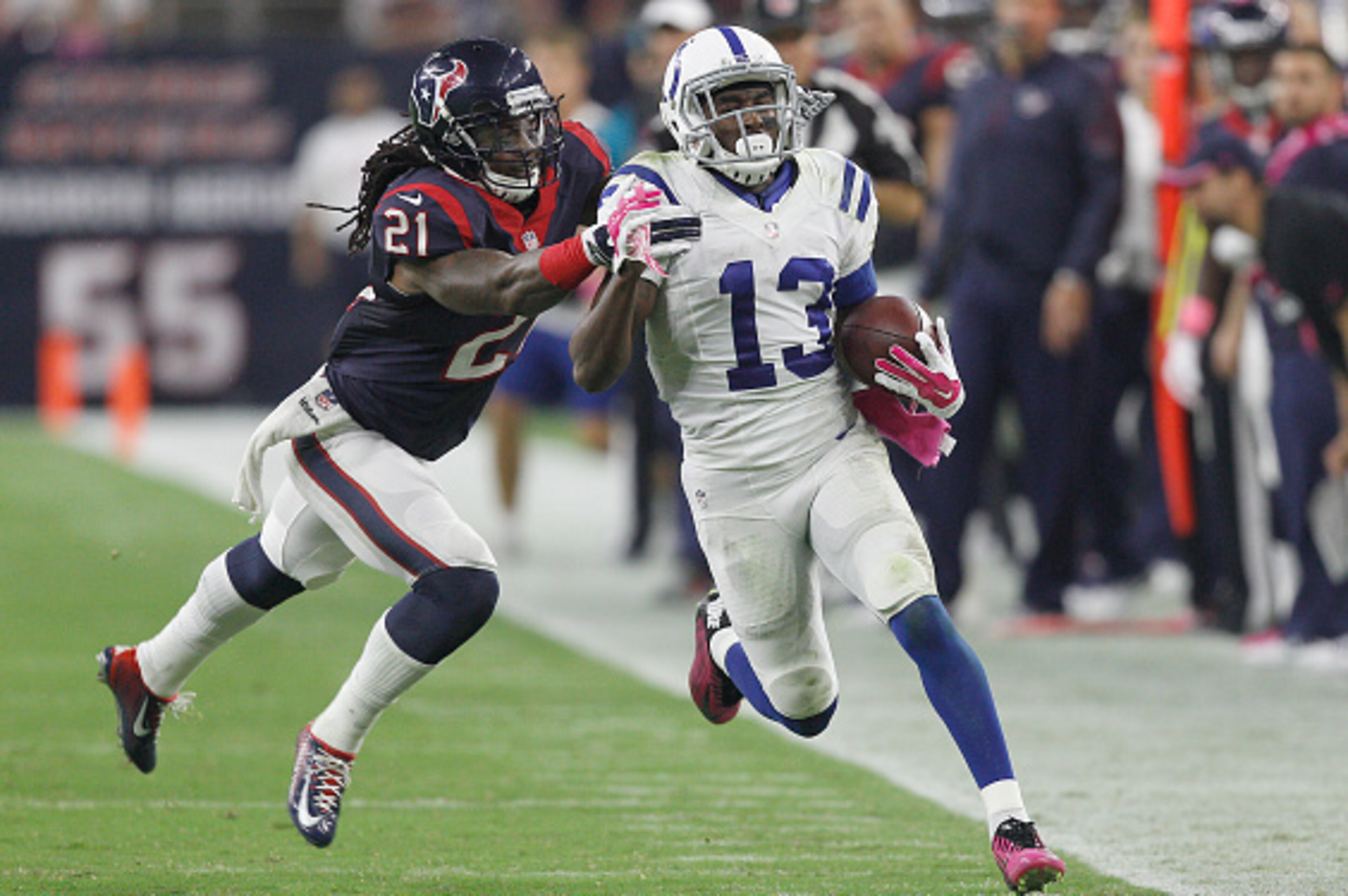 HOUSTON, TX- OCTOBER 09: T.Y. Hilton #13 of the Indianapolis Colts is pushed out of bounds by Kendrick Lewis #21 of the Houston Texans in the third quarter in a NFL game on October 9, 2014 at NRG Stadium in Houston, Texas. (Photo by Bob Levey/Getty Images HOUSTON, TX- OCTOBER 09: T.Y. Hilton #13 of the Indianapolis Colts is pushed out of bounds by Kendrick Lewis #21 of the Houston Texans in the third quarter in a NFL game on October 9, 2014 at NRG Stadium in Houston, Texas. (Photo by Bob Levey/Getty Images
