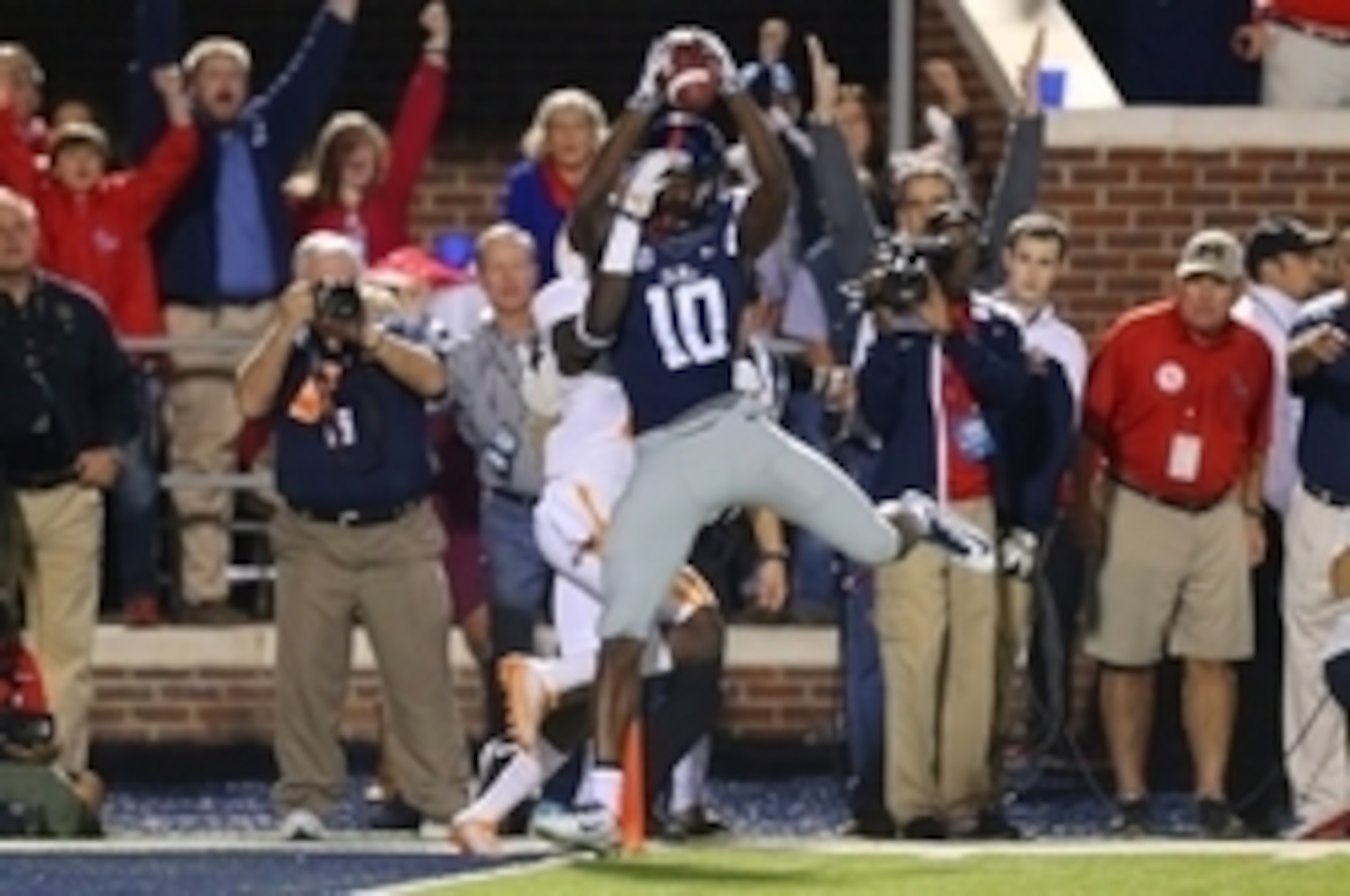 Oct 18, 2014; Oxford, MS, USA; Mississippi Rebels wide receiver Vince Sanders (10) crosses into the end zone for a touchdown during the game against the Tennessee Volunteers at Vaught-Hemingway Stadium. Mandatory Credit: Spruce Derden-USA TODAY Sports