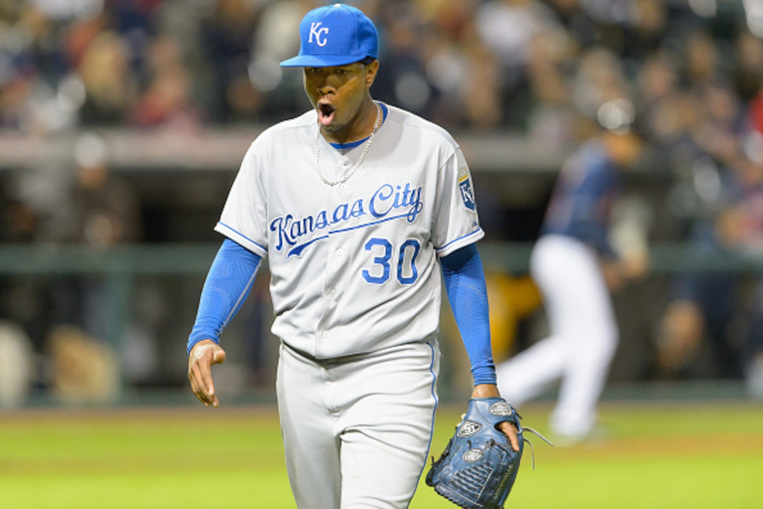 CLEVELAND, OH - SEPTEMBER 23: Starting pitcher Yordano Ventura #30 of the Kansas City Royals reacts after striking out Jose Ramirez of the Cleveland Indians with the bases loaded to end the seventh inning at Progressive Field on September 23, 2014 in Clev