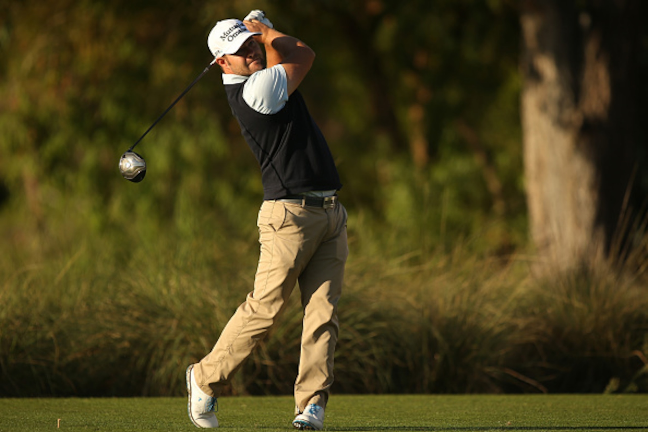LAS VEGAS, NV - OCTOBER 16:  Ryan Moore plays his tee shot on the 12th hole during the first round of the Shriners Hospitals For Children Open at TPC Summerlin on October 16, 2014 in Las Vegas, Nevada.  (Photo by Darren Carroll/Getty Images)