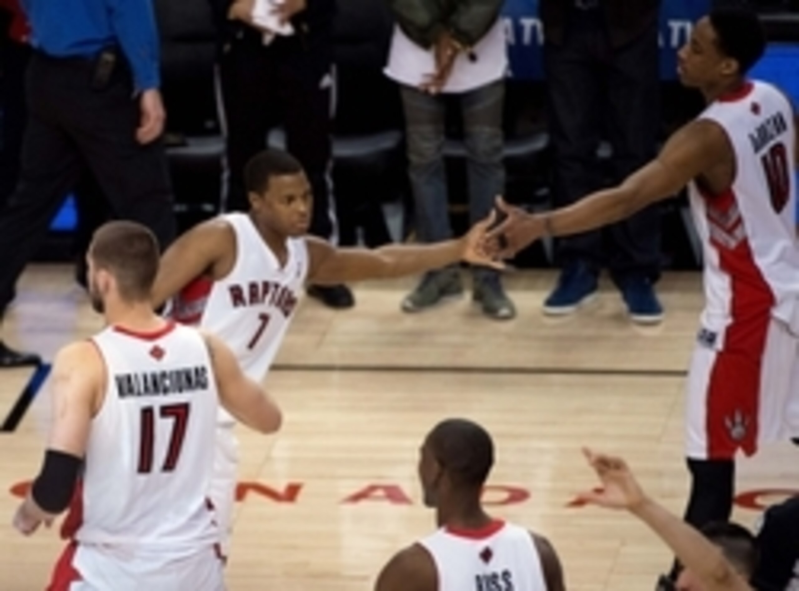 Apr 30, 2014; Toronto, Ontario, CAN; Toronto Raptors guard DeMar DeRozan (10) celebrates the win with Toronto Raptors guard Kyle Lowry (7) in game five of the first round of the 2014 NBA Playoffs against the Brooklyn Nets at Air Canada Centre. The Toronto