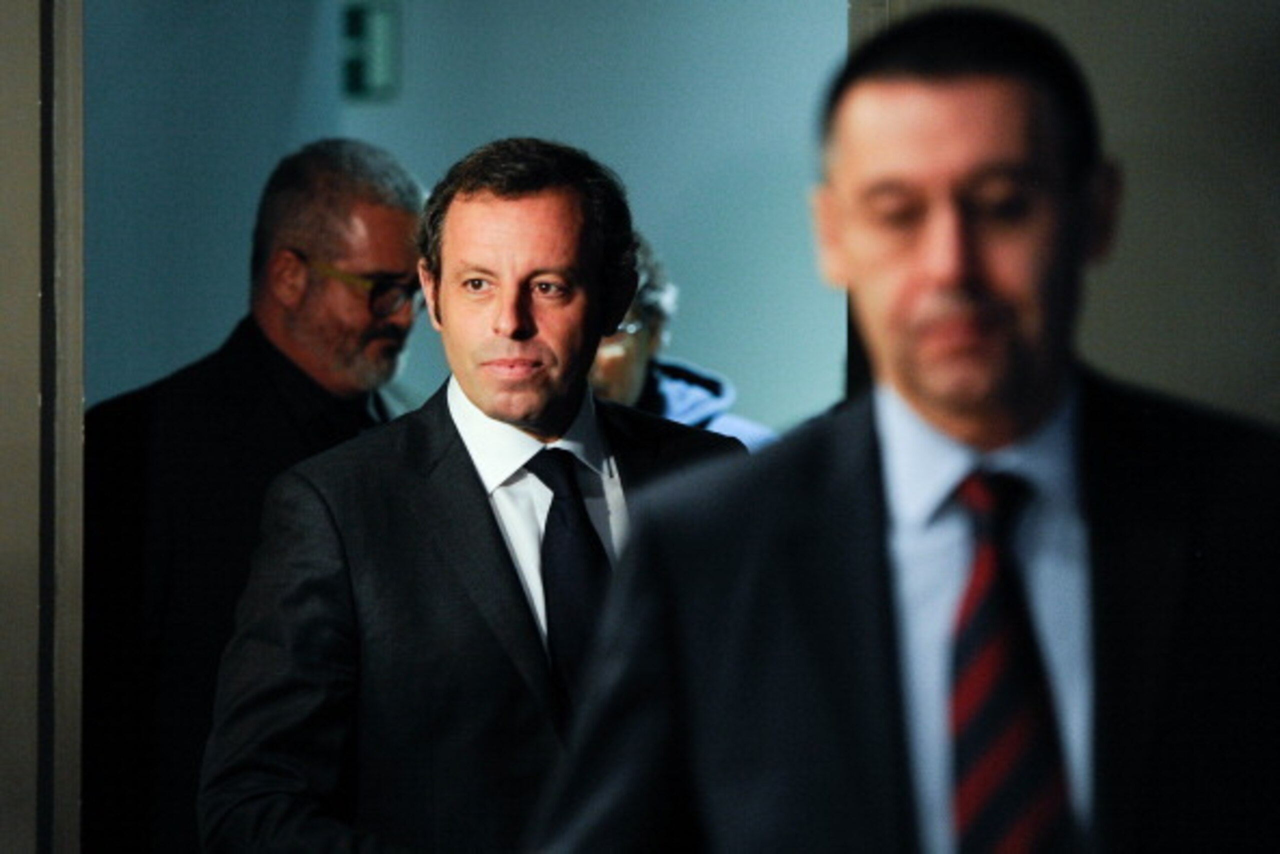 BARCELONA, SPAIN - JANUARY 23: FCB President Sandro Rosell (L) and FCB Vice-President Josep Maria Bartomeu arrives to the press conference announcing his resgination as FCB president on January 23, 2014 in Barcelona, Spain. FCB President Sandro Rosell is 