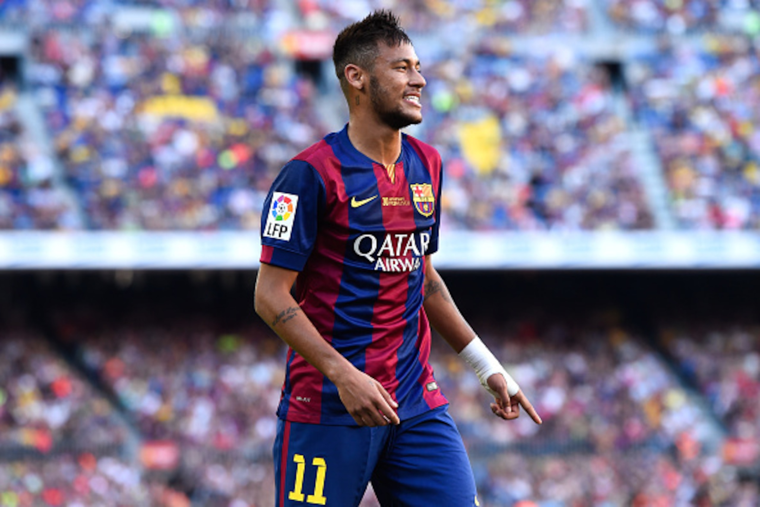 BARCELONA, SPAIN - SEPTEMBER 27:  Neymar of FC Barcelona looks on during the La Liga match between FC Barcelona and Granada CF at Camp Nou on September 27, 2014 in Barcelona, Spain.  (Photo by David Ramos/Getty Images)