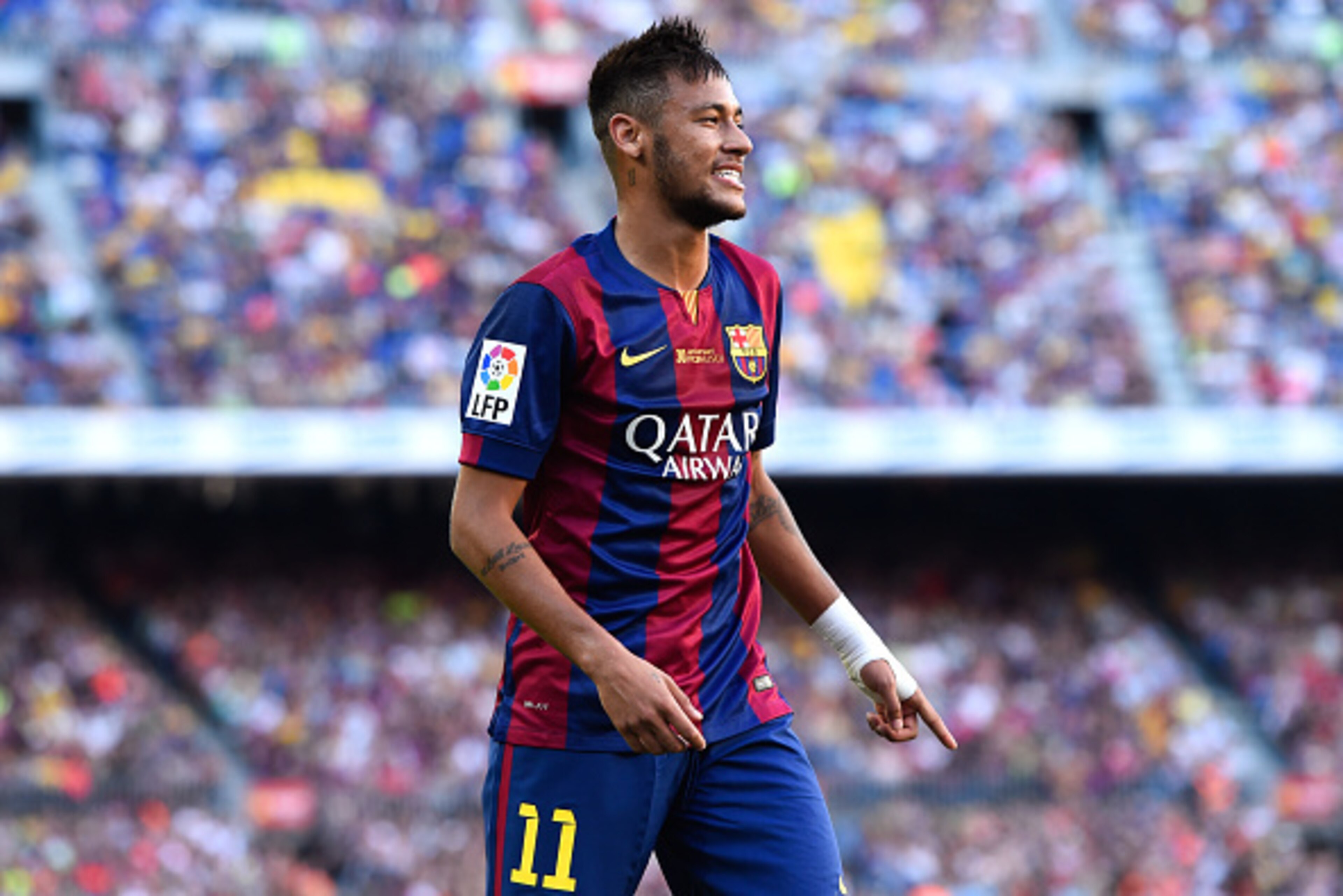 BARCELONA, SPAIN - SEPTEMBER 27:  Neymar of FC Barcelona looks on during the La Liga match between FC Barcelona and Granada CF at Camp Nou on September 27, 2014 in Barcelona, Spain.  (Photo by David Ramos/Getty Images)