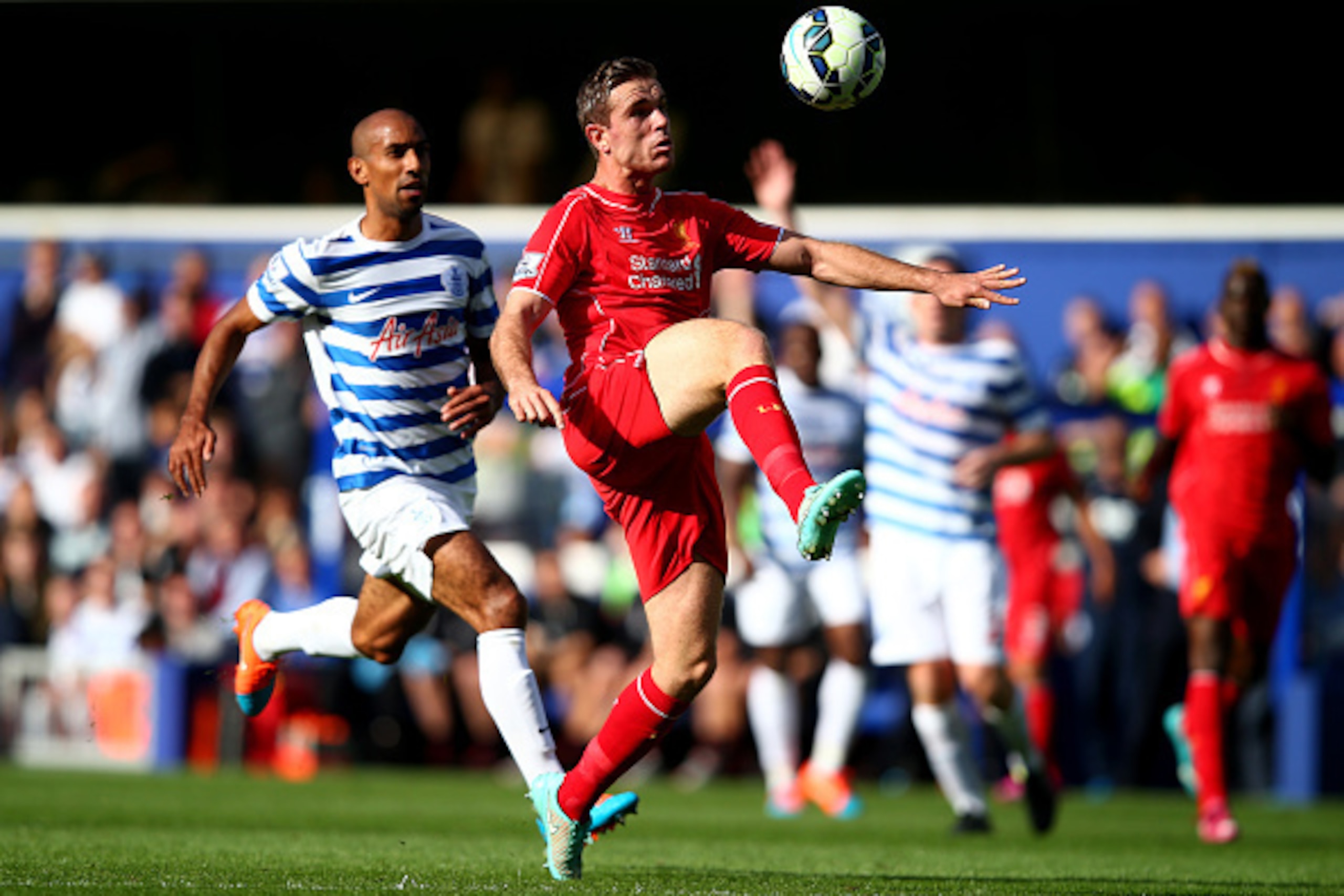 LONDON, ENGLAND - OCTOBER 19:  Jordan Henderson of Liverpool controls the ball during the Barclays Premier League match between Queens Park Rangers and Liverpool at Loftus Road on October 19, 2014 in London, England.  (Photo by Clive Rose/Getty Images)