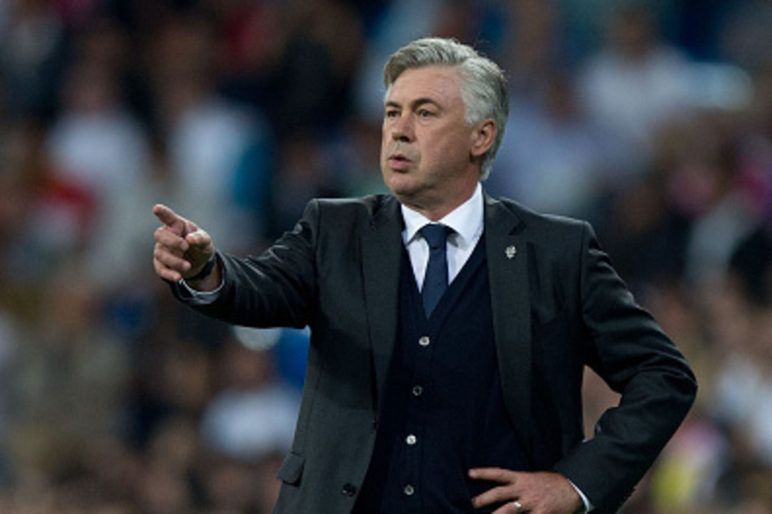 MADRID, SPAIN - SEPTEMBER 23: Head coach Carlo Ancelotti of Real Madrid CF gives instructions during the La Liga match between Real Madrid CF and Elche CF at Estadio Santiago Bernabeu on September 23, 2014 in Madrid, Spain.  (Photo by Gonzalo Arroyo Moren
