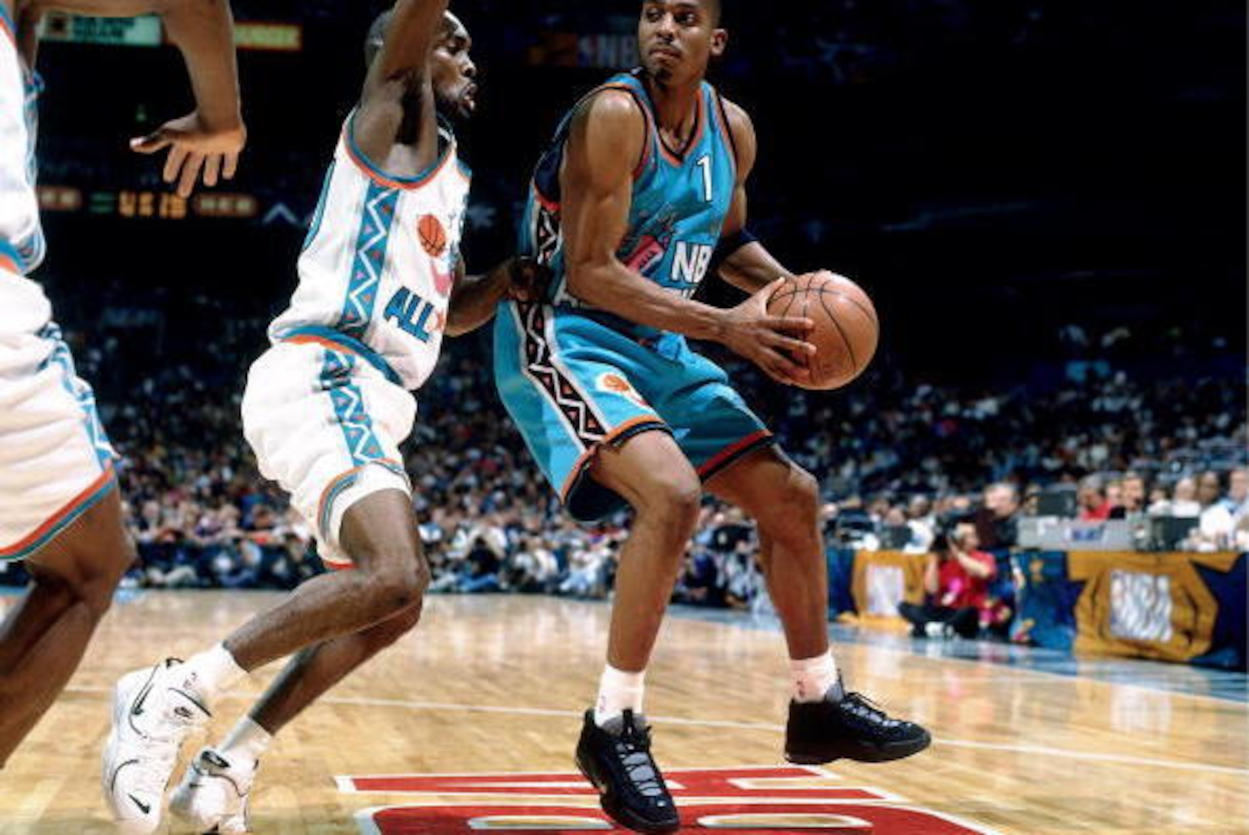 SAN ANTONIO - FEBRUARY 11:  Anfernee 'Penny' Hardaway #1 of the Eastern Conference All Stars dribbles against Gary Payton #20 of the Western Conference All Stars during the 1996 NBA All Star Game played on February 11, 1996 at the Alamo Dome in San Antoni