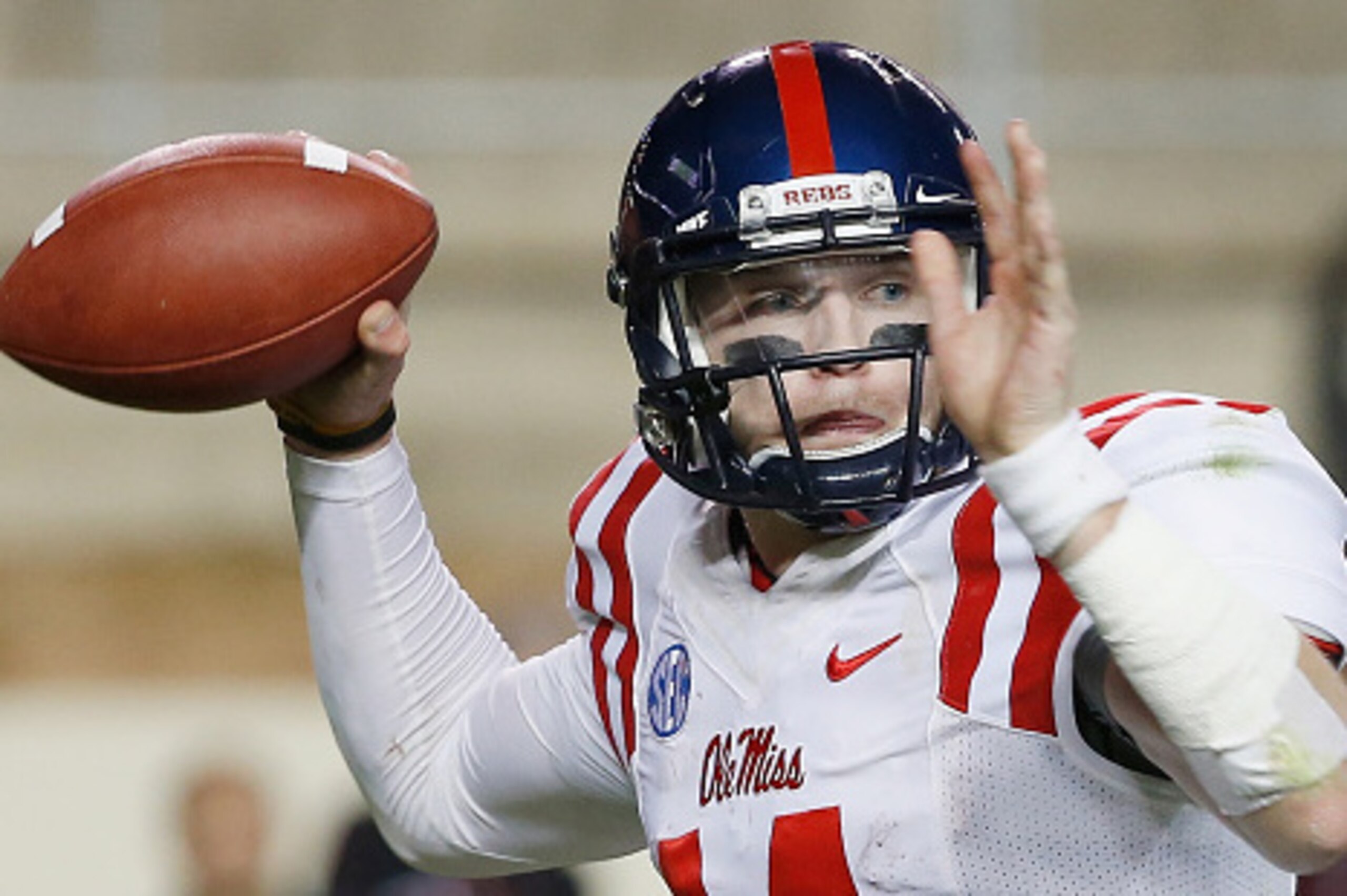 COLLEGE STATION, TX - OCTOBER 11:  Bo Wallace #14 of the Mississippi Rebels throws a pass in the fourth quarter during their game against the Texas A&M Aggies at Kyle Field on October 11, 2014 in College Station, Texas.  (Photo by Scott Halleran/Getty Ima