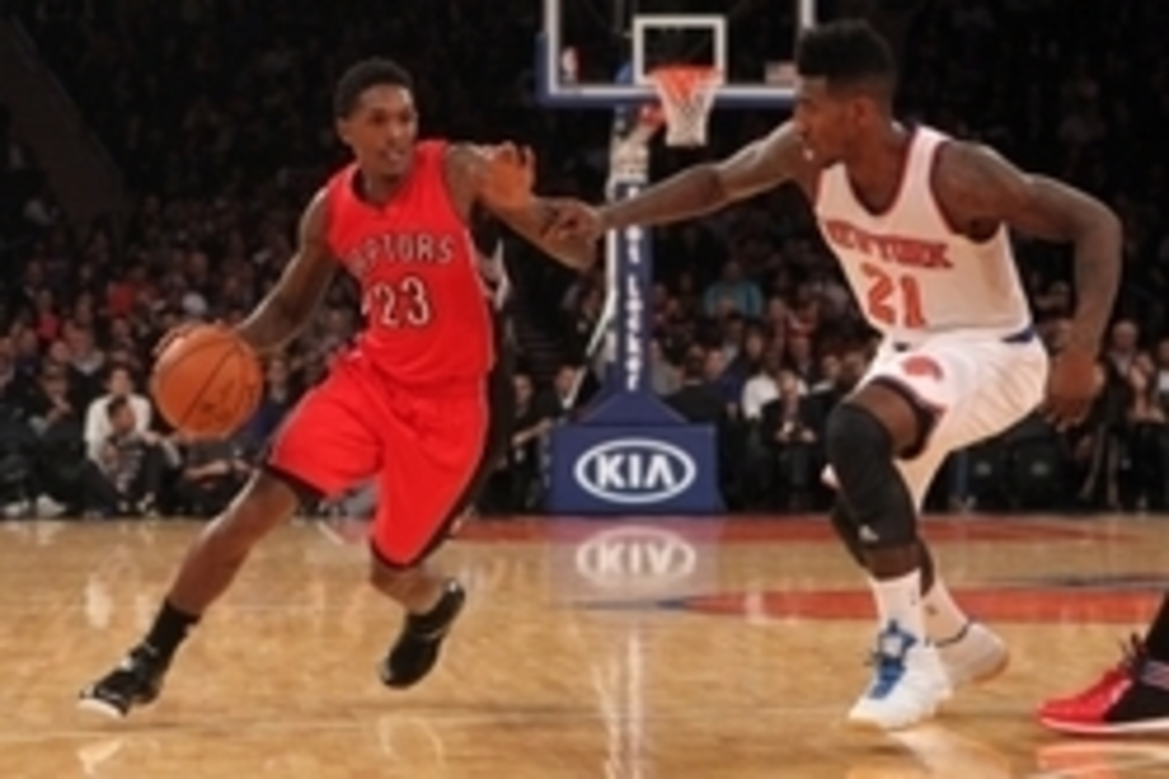 Oct 13, 2014; New York, NY, USA; Toronto Raptors shooting guard Louis Williams (23) controls the ball against New York Knicks shooting guard Iman Shumpert (21) during the second quarter at Madison Square Garden. Mandatory Credit: Brad Penner-USA TODAY Spo