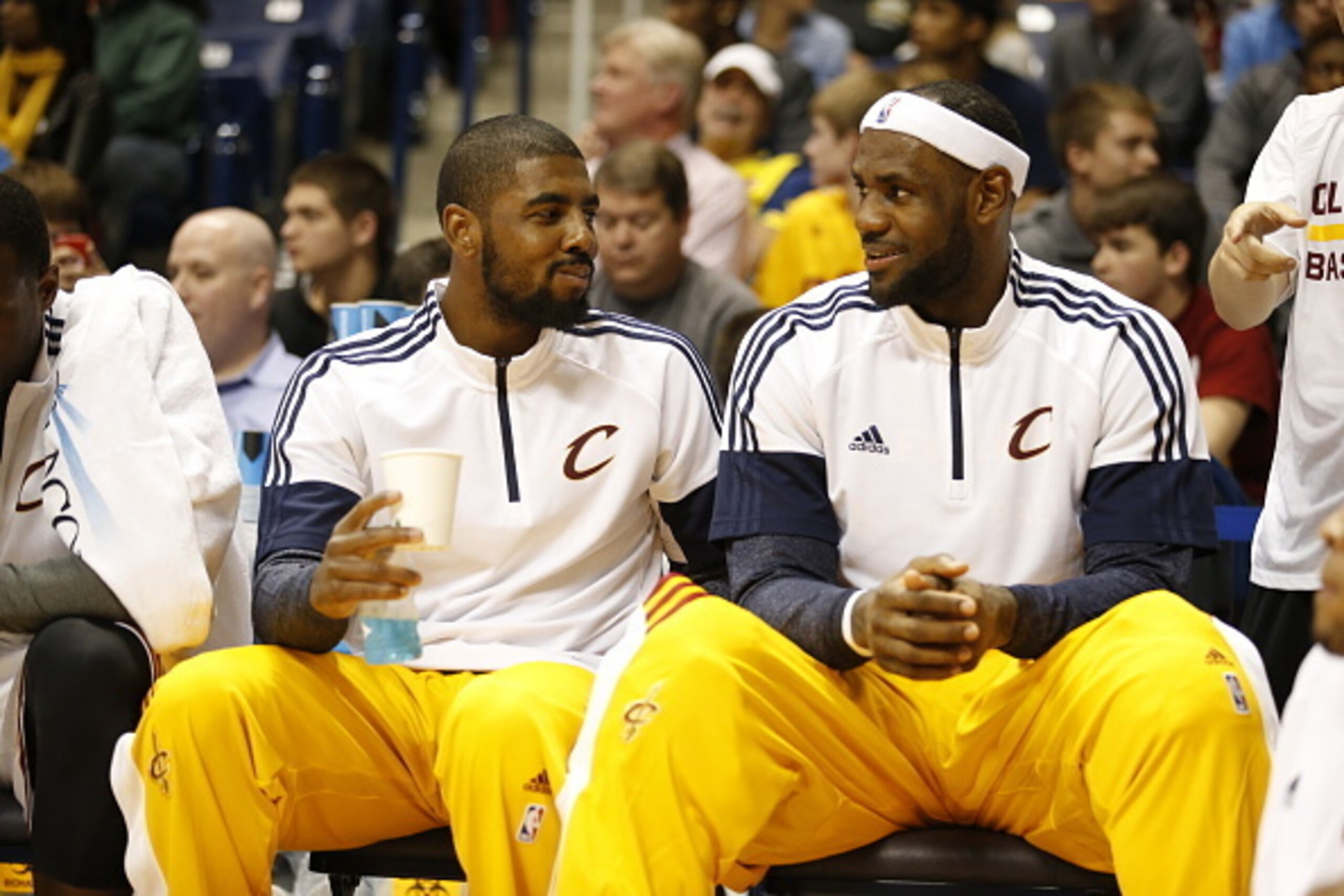 CINNCINNATI, OH - OCTOBER 15:  Kyrie Irving #2 of the Cleveland Cavaliers and teammate LeBron James #23 of sit on the bench during the game against the Indiana Pacers at the Cintas Center at Xavier University on October 15, 2014 in Cincinnati, Ohio. NOTE 