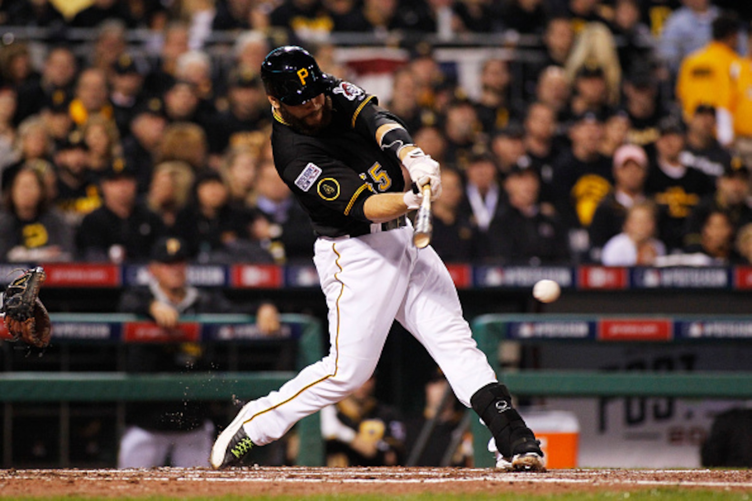 PITTSBURGH, PA - OCTOBER 01: Russell Martin #55 of the Pittsburgh Pirates hits a single in the second inning against the San Francisco Giants during the National League Wild Card game at PNC Park on October 1, 2014 in Pittsburgh, Pennsylvania. (Photo by PITTSBURGH, PA - OCTOBER 01: Russell Martin #55 of the Pittsburgh Pirates hits a single in the second inning against the San Francisco Giants during the National League Wild Card game at PNC Park on October 1, 2014 in Pittsburgh, Pennsylvania. (Photo by
