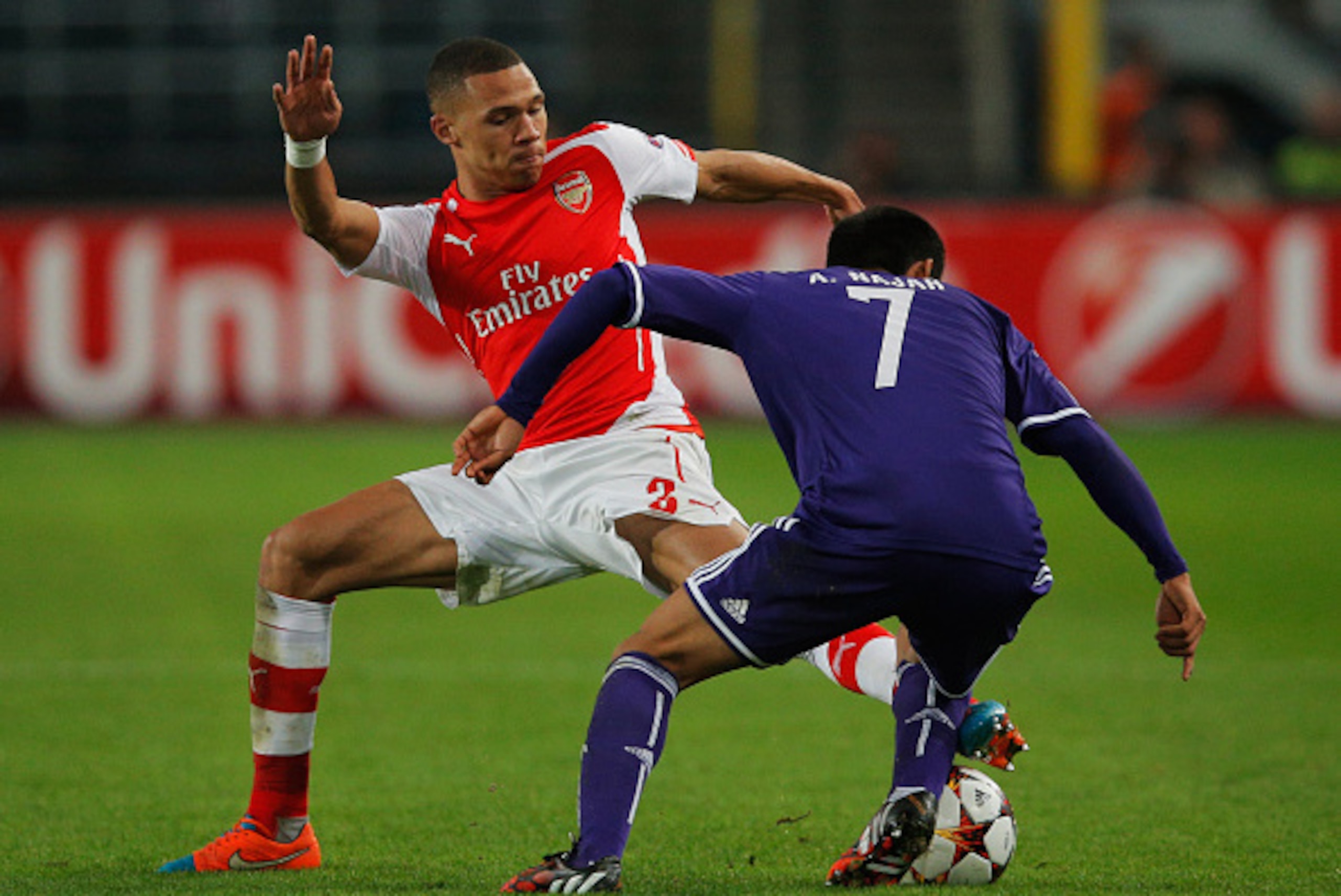 BRUSSELS, BELGIUM - OCTOBER 22:  Andy Najar of Anderlecht takes on Kieran Gibbs of Arsenal during the UEFA Champions League Group D match between RSC Anderlecht and Arsenal at Constant Vanden Stock Stadium on October 22, 2014 in Brussels, Belgium.  (Photo