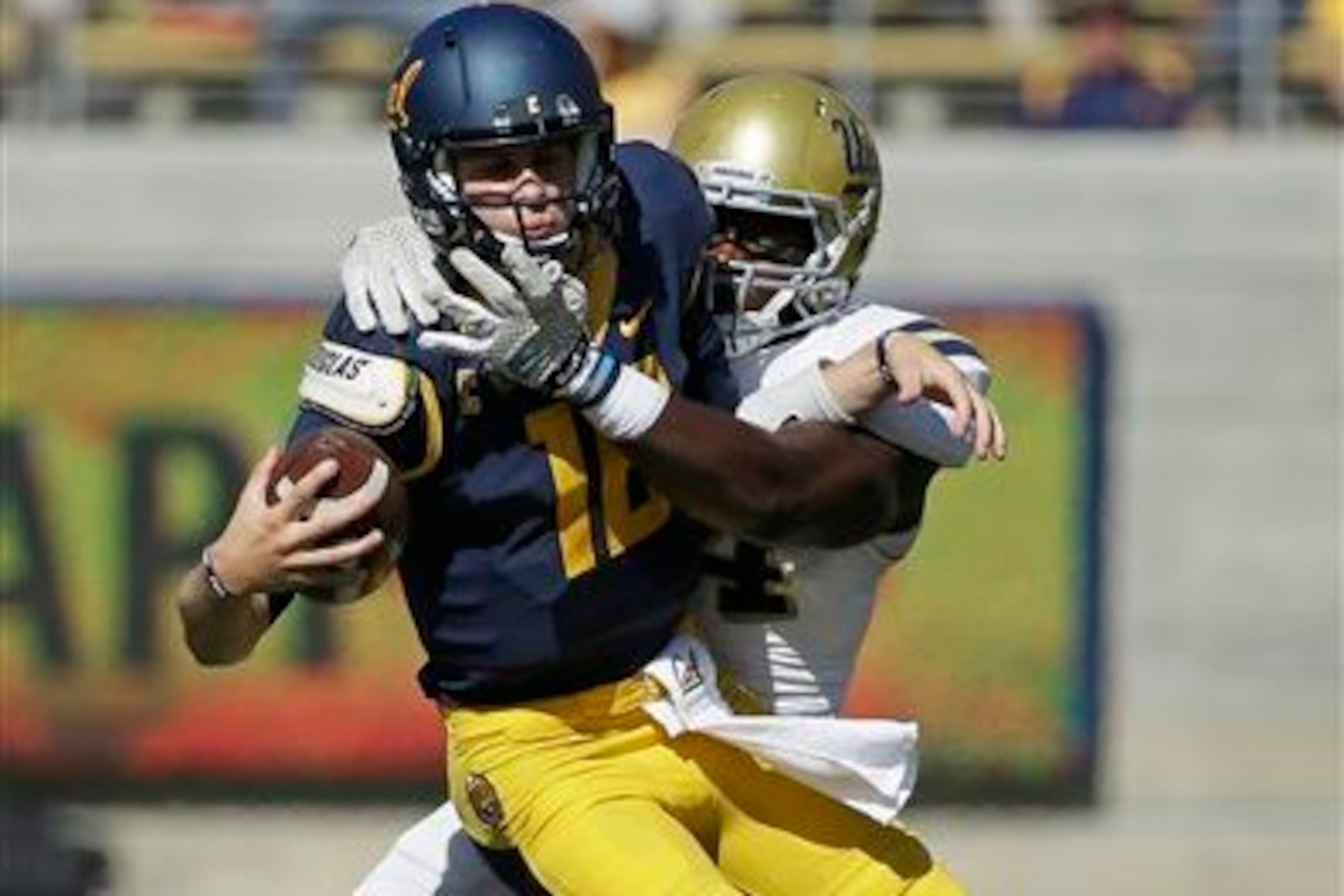 UCLA DE Owamagbe Odighizuwa sacks Cal QB Jared Goff. UCLA DE Owamagbe Odighizuwa sacks Cal QB Jared Goff.