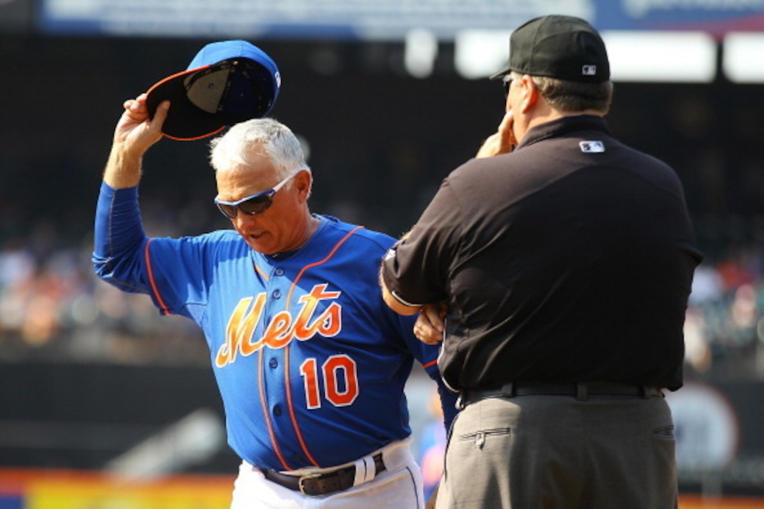 NEW YORK, NY - AUGUST 21: Terry Collins #10 of the New York Mets is ejected after arguing with firstbase umpire Jerry Layne #24 in the tenth inning against the Atlanta Braves at Citi Field on August 21, 2013 at Citi Field in the Flushing neighborhood of t