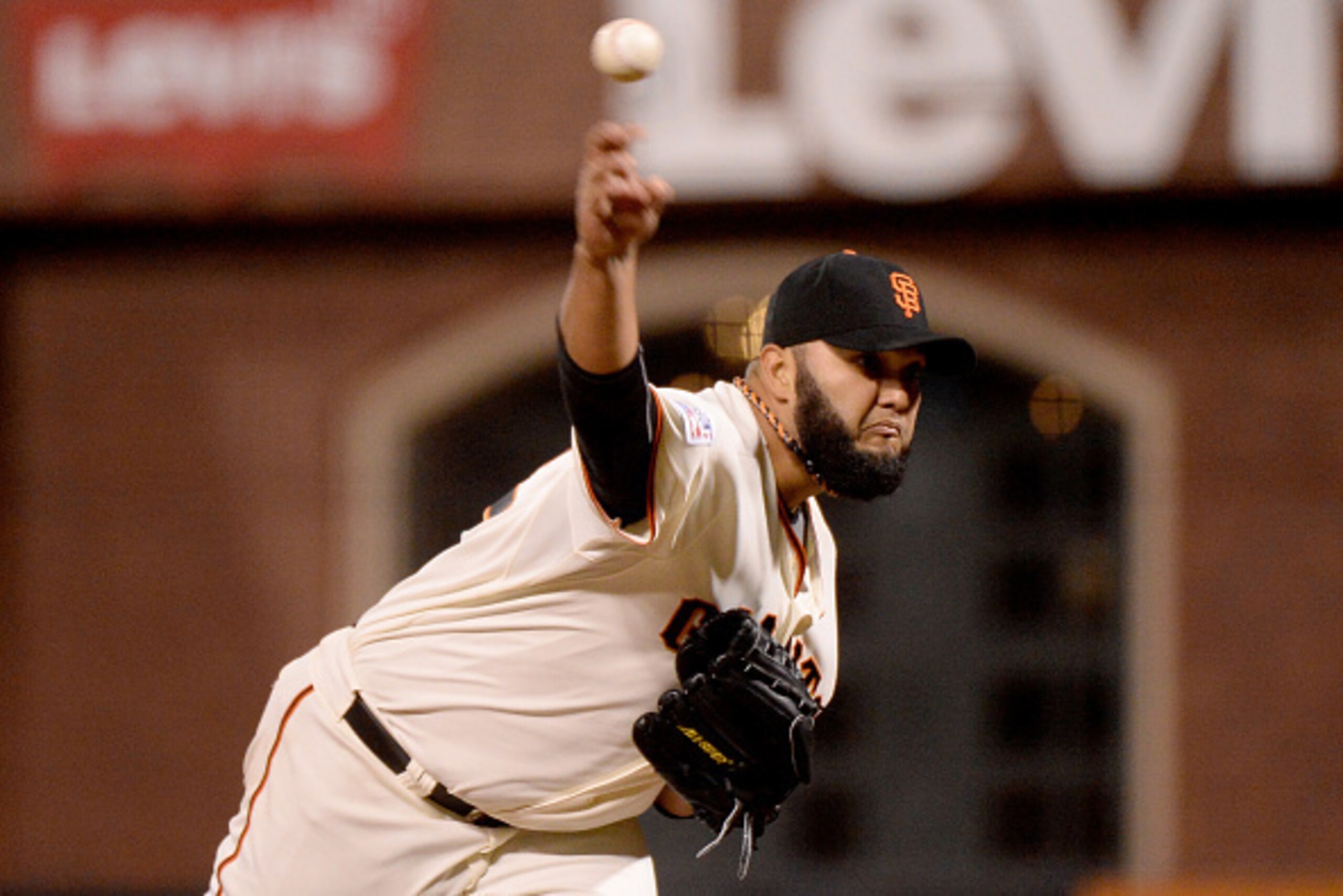 SAN FRANCISCO, CA - OCTOBER 15:  Yusmeiro Petit #52 of the San Francisco Giants pitches in the fourth inning against the St. Louis Cardinals during Game Four of the National League Championship Series at AT&T Park on October 15, 2014 in San Francisco, Cal