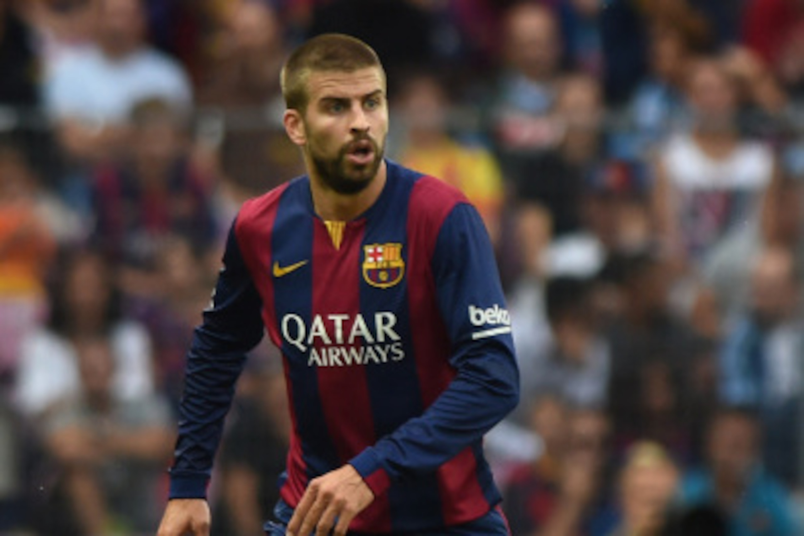 GENEVA, SWITZERLAND - AUGUST 06:  Gerard Pique of FC Barcelona in action during the pre-season friendly match between FC Barcelona and SSC Napoli on August 6, 2014 in Geneva, Switzerland.  (Photo by Valerio Pennicino/Getty Images)
