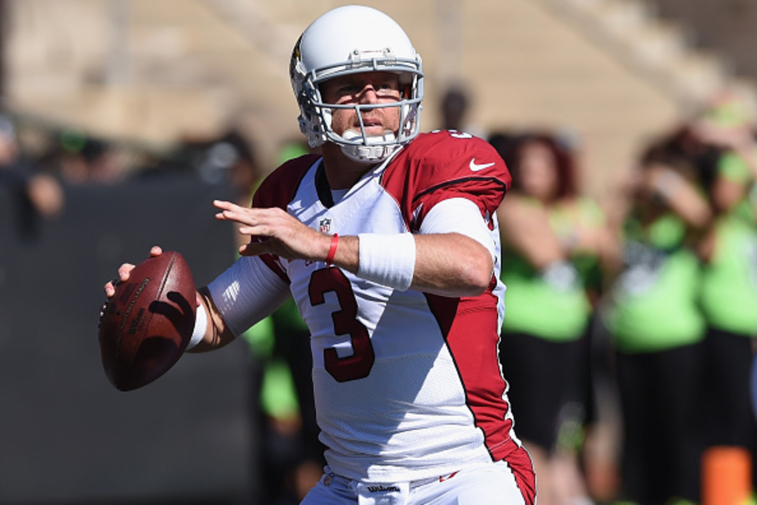 OAKLAND, CA - OCTOBER 19:  Carson Palmer #3 of the Arizona Cardinals warms up at O.co Coliseum on October 19, 2014 in Oakland, California.  (Photo by Thearon W. Henderson/Getty Images)