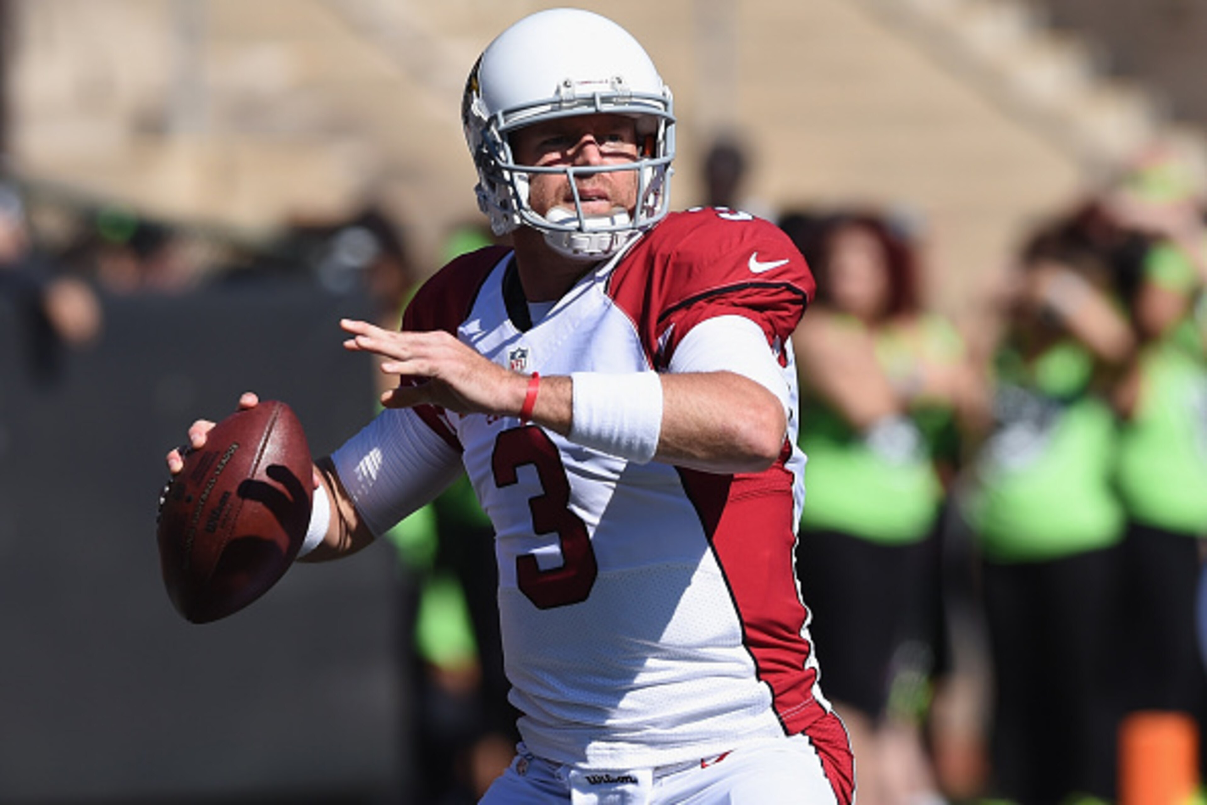 OAKLAND, CA - OCTOBER 19:  Carson Palmer #3 of the Arizona Cardinals warms up at O.co Coliseum on October 19, 2014 in Oakland, California.  (Photo by Thearon W. Henderson/Getty Images)