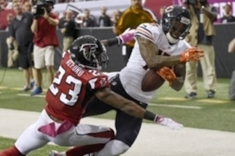 Oct 12, 2014; Atlanta, GA, USA; Chicago Bears wide receiver Brandon Marshall (15) can't hold on to a pass in the end zone defended by Atlanta Falcons cornerback Robert Alford (23) during the first half at the Georgia Dome. Mandatory Credit: Dale Zanine-US