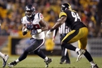 Oct 20, 2014; Pittsburgh, PA, USA; Houston Texans running back Alfred Blue (28) carries the ball against Pittsburgh Steelers inside linebacker Lawrence Timmons (94) during the second quarter at Heinz Field. Mandatory Credit: Charles LeClaire-USA TODAY Spo