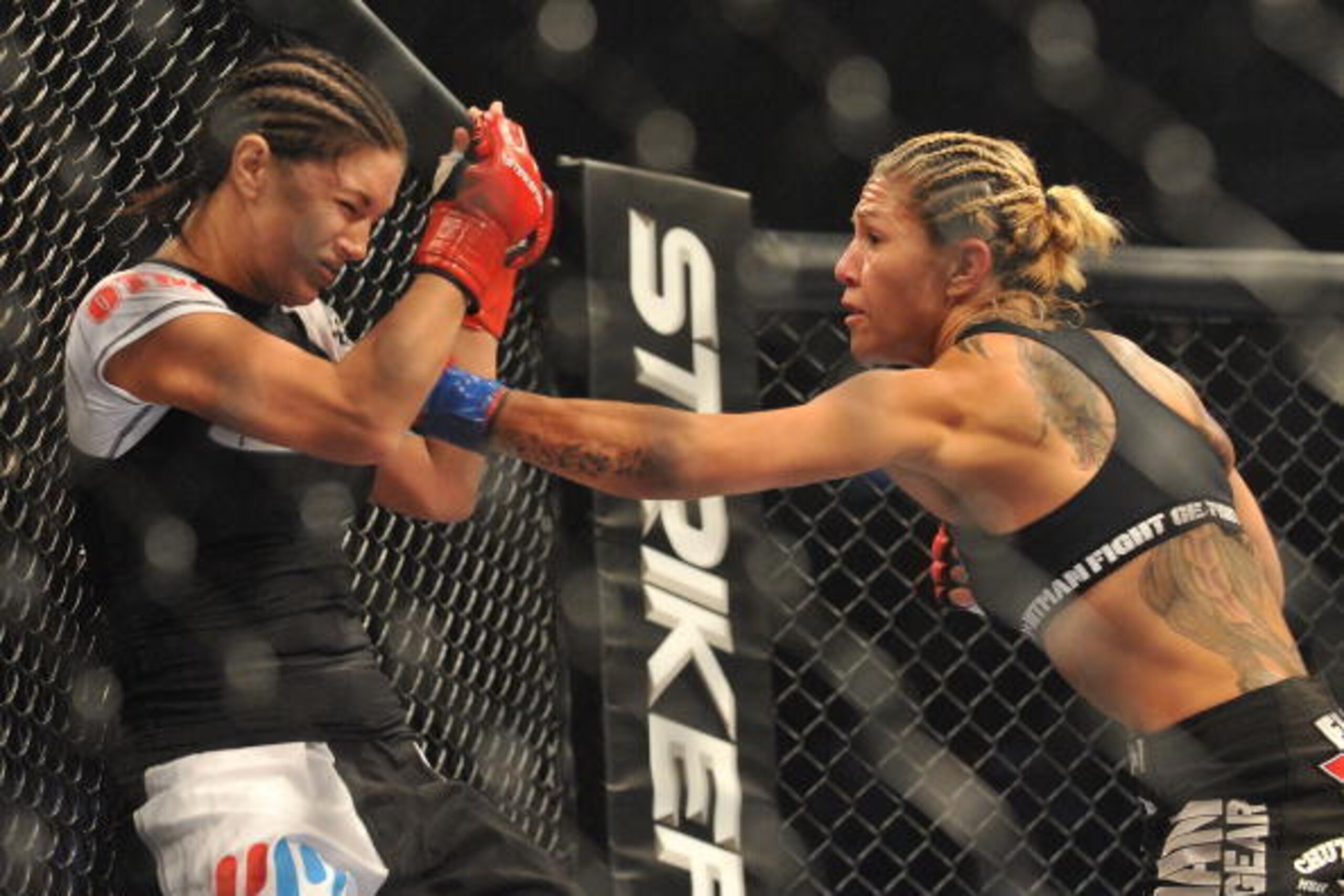 SAN JOSE, CA - AUGUST 15: Cris Cyborg (R) battles Gina Carano during their Middleweight Championship fight at Stikeforce: Carano vs. Cyborg on August 15, 2009 in San Jose, California. (Photo by Jon Kopaloff/Getty Images) SAN JOSE, CA - AUGUST 15: Cris Cyborg (R) battles Gina Carano during their Middleweight Championship fight at Stikeforce: Carano vs. Cyborg on August 15, 2009 in San Jose, California. (Photo by Jon Kopaloff/Getty Images)