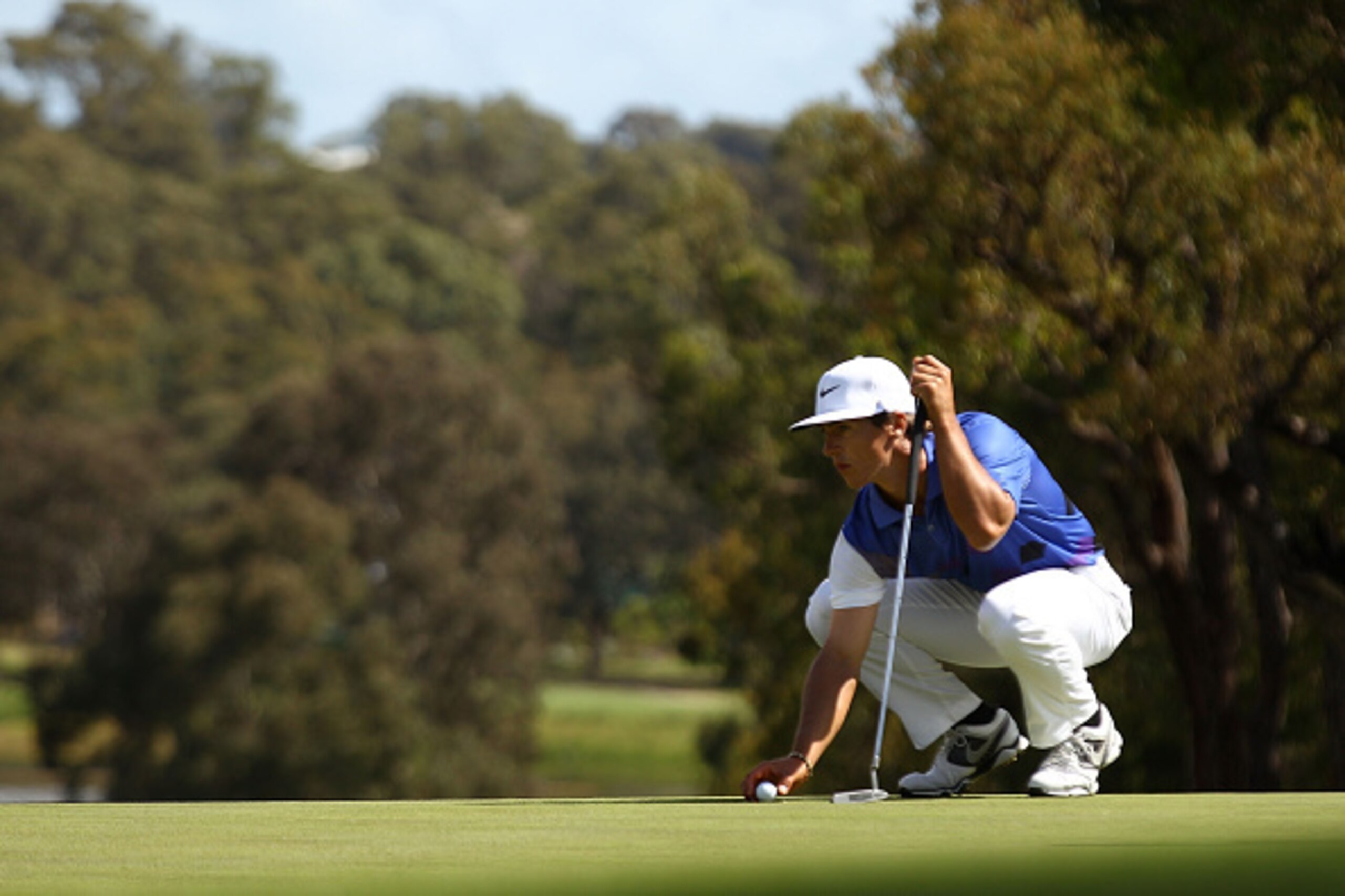 PERTH, AUSTRALIA - OCTOBER 23:  Thorbjorn Olesen of Denmark lines up his putt on the 14th green during day one of the 2014 Perth International at Lake Karrinyup Country Club on October 23, 2014 in Perth, Australia.  (Photo by Paul Kane/Getty Images)
