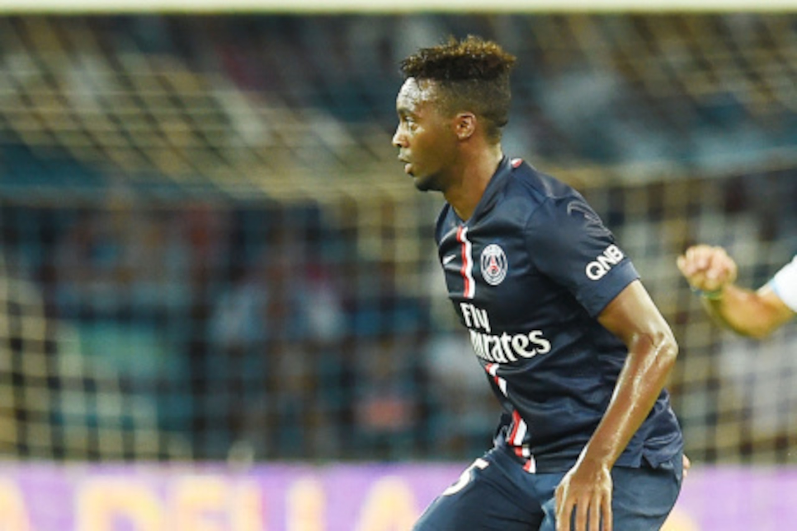 NAPLES, ITALY - AUGUST 11:  Jean Christophe Bahebeck of Paris Saint Germain in action during the pre-season friendly match between SSC Napoli and Paris Saint-Germain FC at Stadio San Paolo on August 11, 2014 in Naples, Italy.  (Photo by Giuseppe Bellini/G