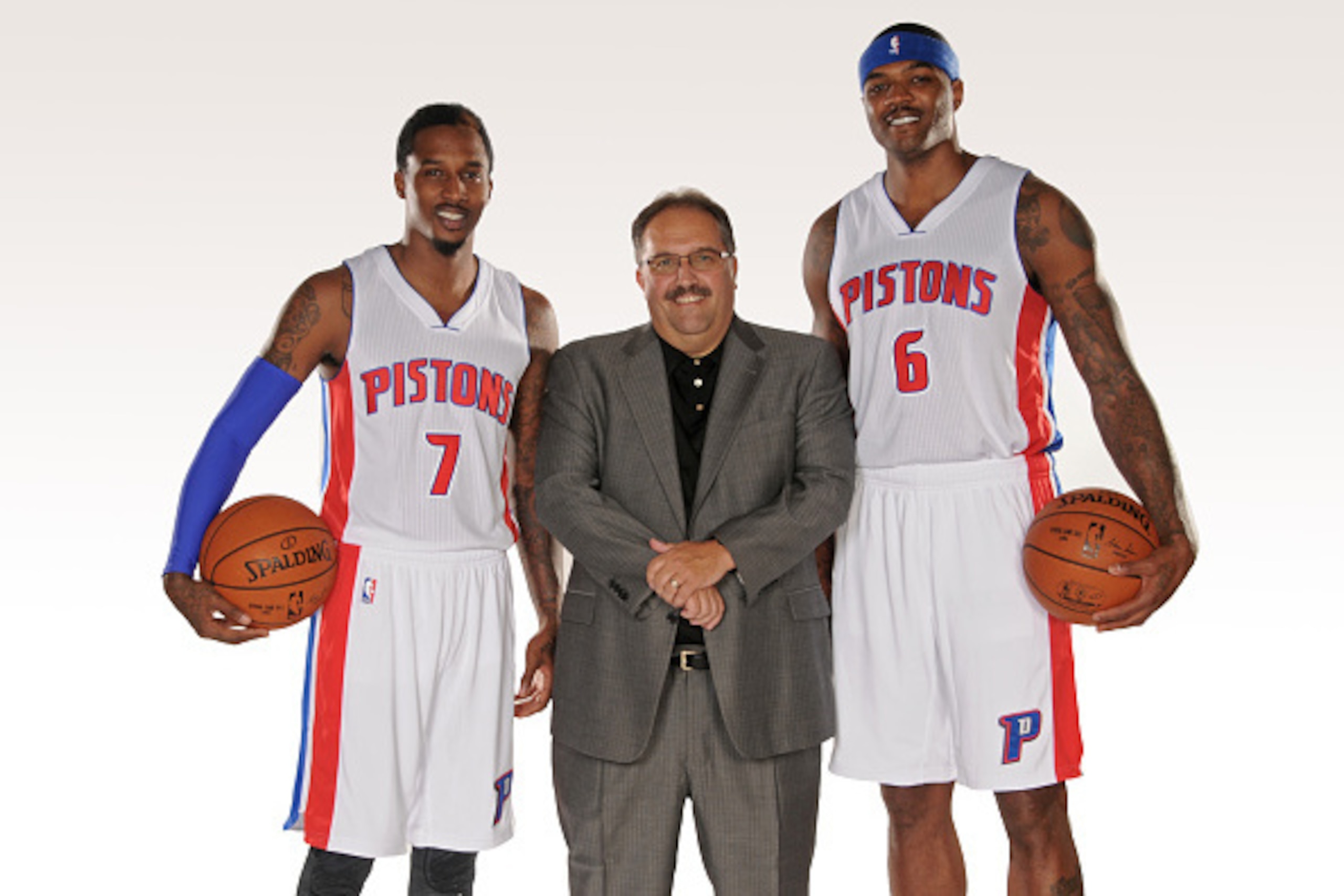 AUBURN HILLS, MI - SEPTEMBER 29: Brandon Jennings #7, Head Coach Stan Van Gundy, and Josh Smith #6 of the Detroit Pistons pose for a portrait during Detroit Pistons Media Day on September 29, 2014 at The Palace of Auburn Hills in Auburn Hills, Michigan. N