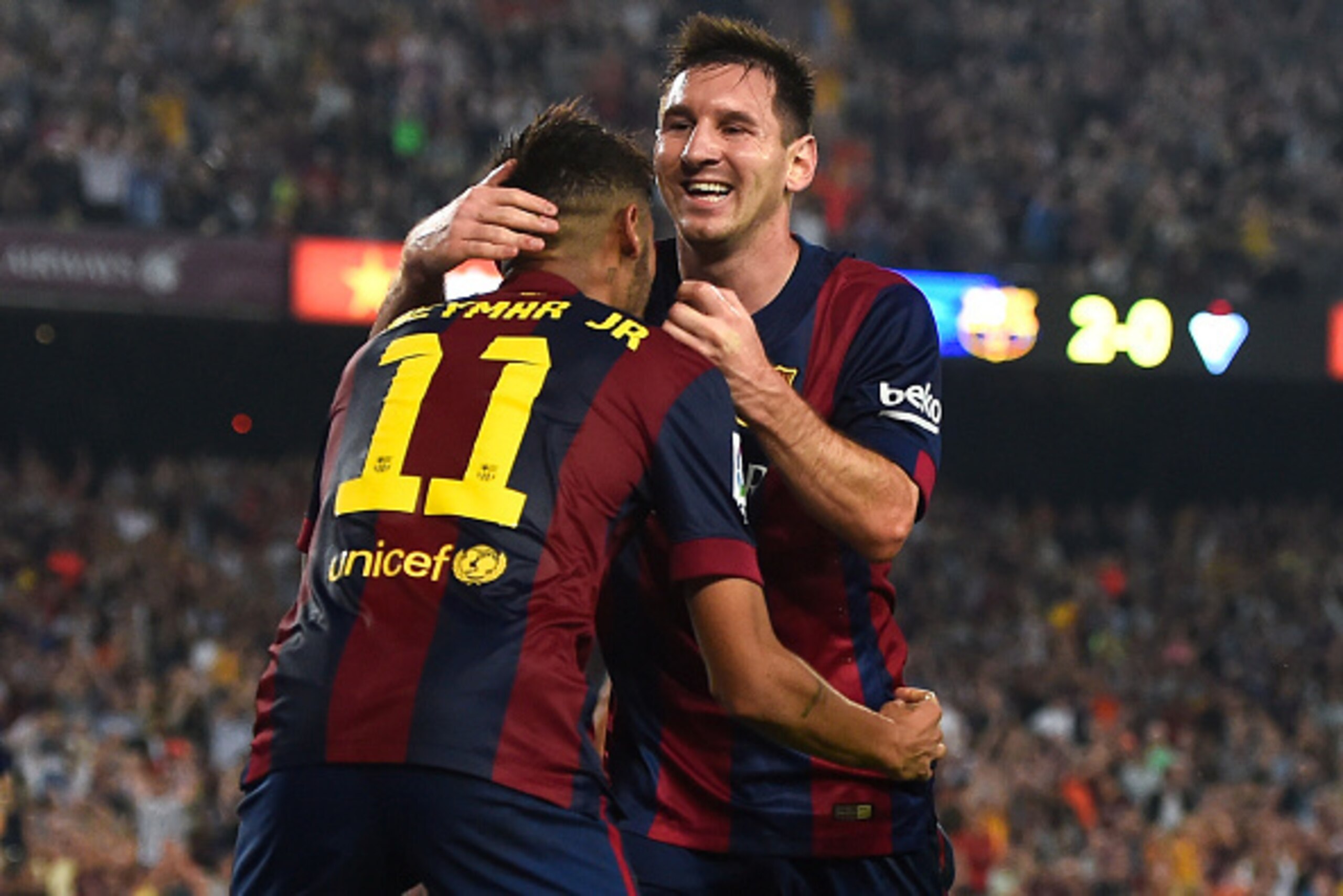 BARCELONA, SPAIN - OCTOBER 18:  Lionel Messi of FC Barcelona celebrates with his teammate Neymar of FC Barcelona after scoring his team's third goal during the La Liga match between FC Barcelona and SD Eibar at Camp Nou on October 18, 2014 in Barcelona, S