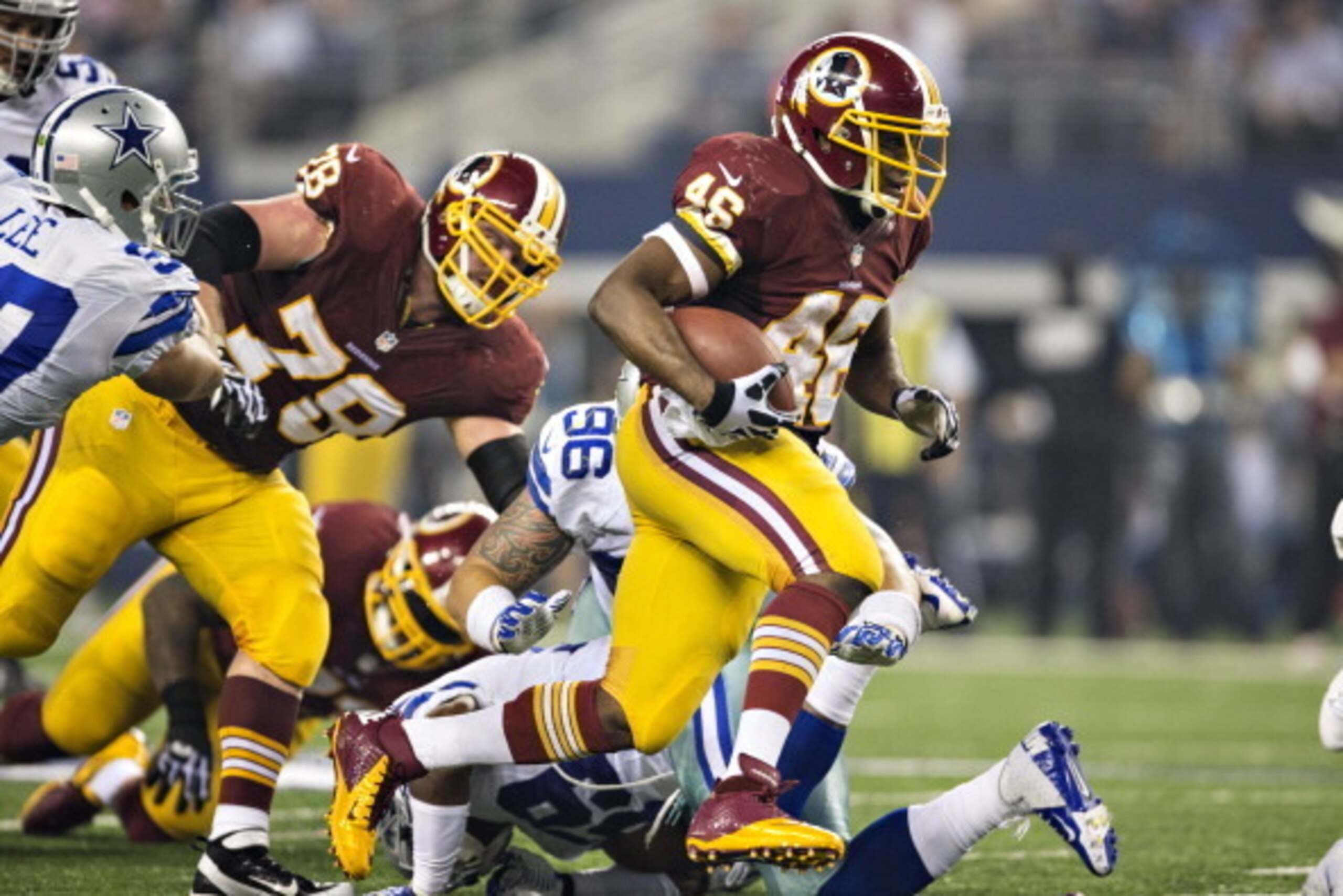 ARLINGTON, TX - OCTOBER 13:  Alfred Morris #46 of the Washington Redskins runs the ball against the Dallas Cowboys at AT&T Stadium on October 13, 2013 in Arlington, Texas.  The Cowboys defeated the Redskins 31-16.  (Photo by Wesley Hitt/Getty Images)