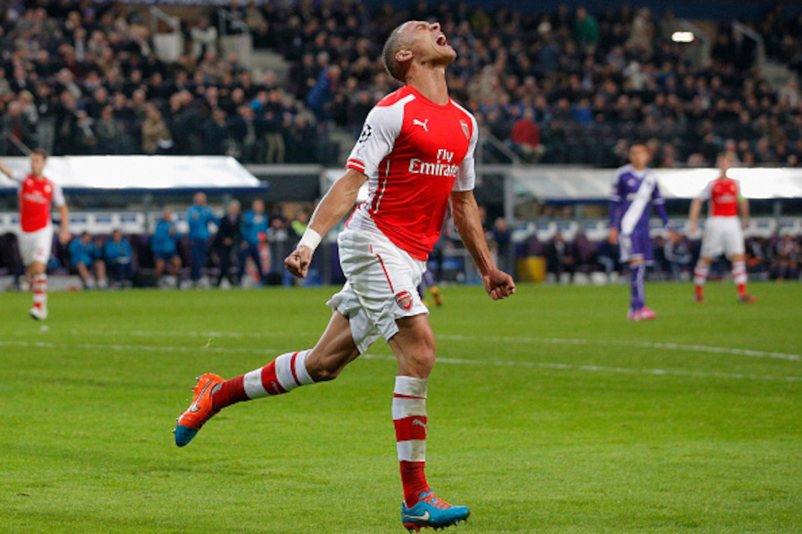 BRUSSELS, BELGIUM - OCTOBER 22:  Kieran Gibbs of Arsenal celebrates as he scores their first and equalising goal during the UEFA Champions League Group D match between RSC Anderlecht and Arsenal at Constant Vanden Stock Stadium on October 22, 2014 in Brus