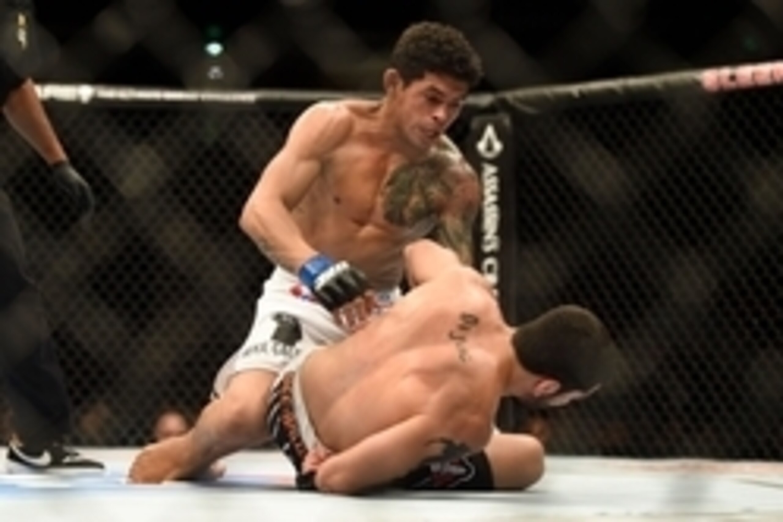 August 30, 2014; Sacramento, CA, USA; Carlos Diego Ferreira (blue gloves) fights Ramsey Nijem (red gloves)  during the lightweight bout of UFC 177 at Sleep Train Arena. Mandatory Credit: Kyle Terada-USA TODAY Sports