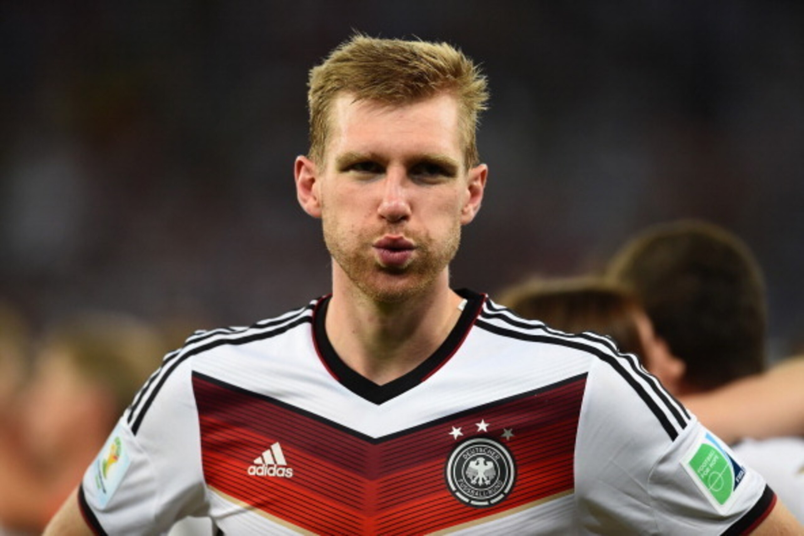 RIO DE JANEIRO, BRAZIL - JULY 13: Per Mertesacker of Germany reacts after defeating Argentina 1-0 in extra time during the 2014 FIFA World Cup Brazil Final match between Germany and Argentina at Maracana on July 13, 2014 in Rio de Janeiro, Brazil.  (Photo