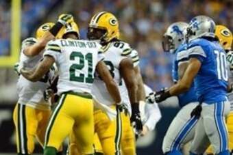Sep 21, 2014; Detroit, MI, USA; Green Bay Packers free safety Ha Ha Clinton-Dix (21) celebrates with teammates after intercepting a pass during the first quarter against the Detroit Lions at Ford Field. Mandatory Credit: Andrew Weber-USA TODAY Sports