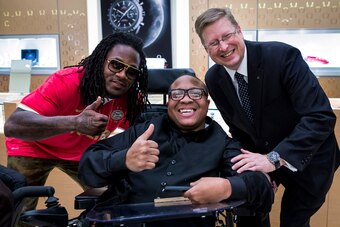 Adam Jones with Jarvis Brown and Omega Boutique manager Tim McCain