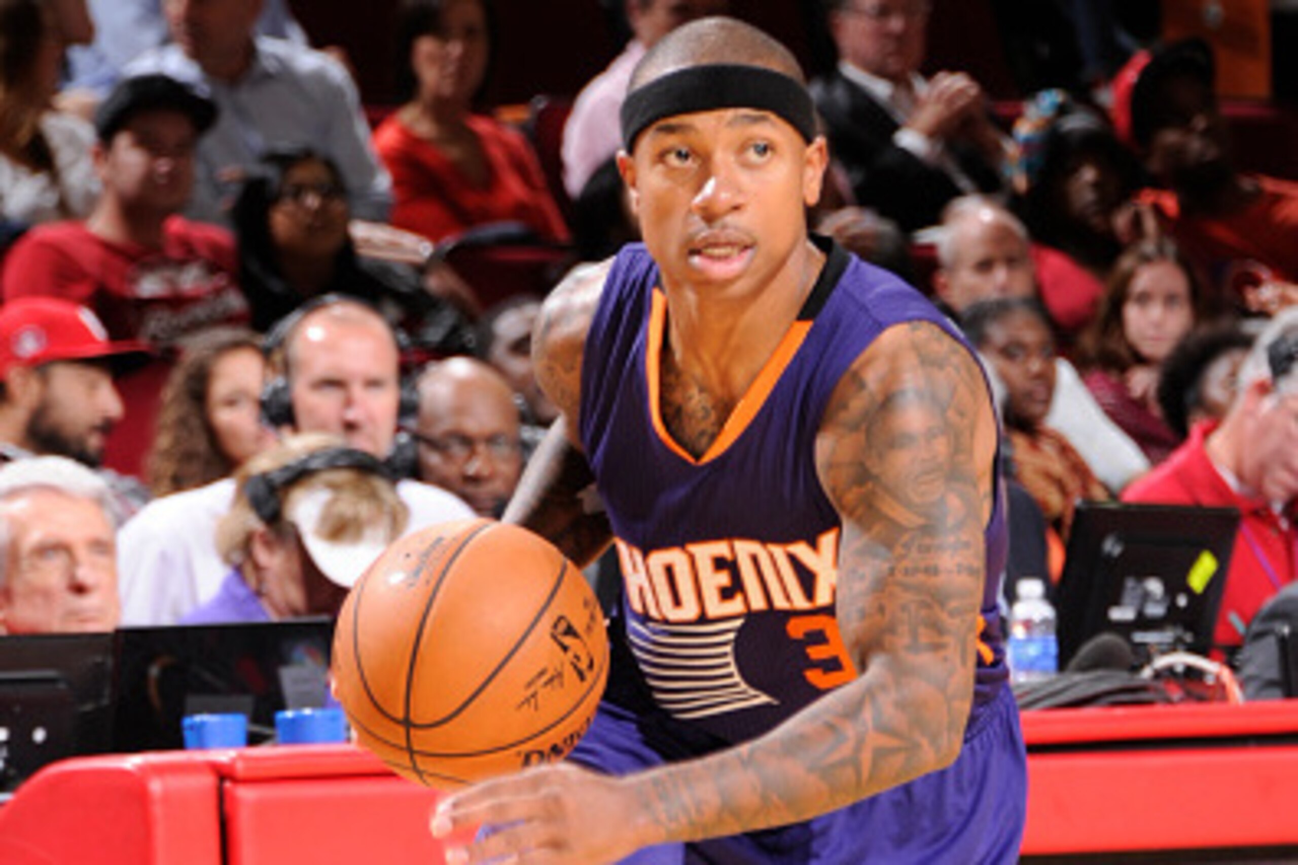 HOUSTON, TX - OCTOBER 13:  Isaiah Thomas #3 of the Phoenix Suns handles the ball against the Houston Rockets on October 13, 2014 at the Toyota Center in Houston, Texas. NOTE TO USER: User expressly acknowledges and agrees that, by downloading and or using