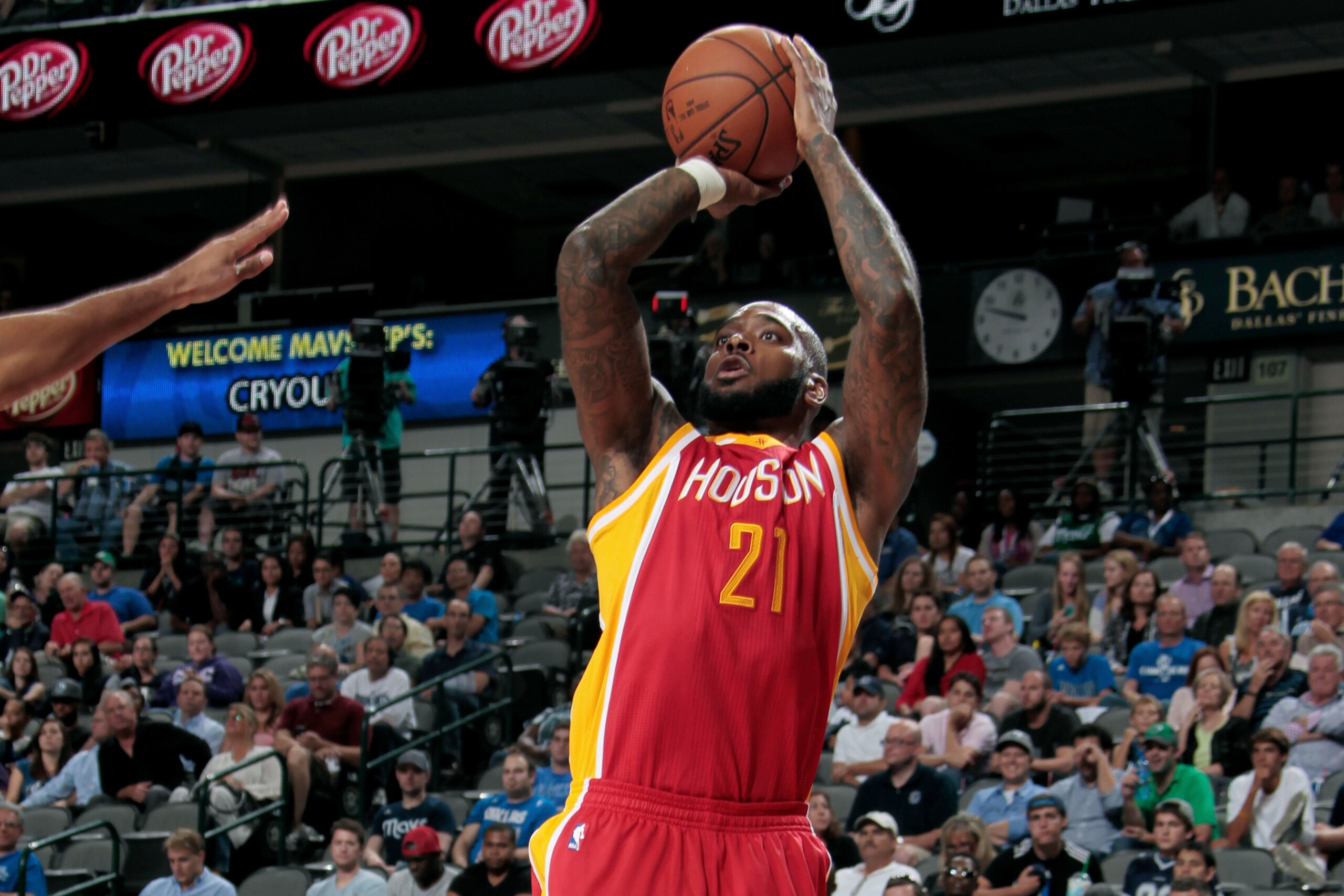 DALLAS, TX - OCTOBER 7: Josh Powell #21 of the Houston Rockets shoots a jumper against the Dallas Mavericks on October 7, 2014 at the American Airlines Center in Dallas, Texas. NOTE TO USER: User expressly acknowledges and agrees that, by downloading and
